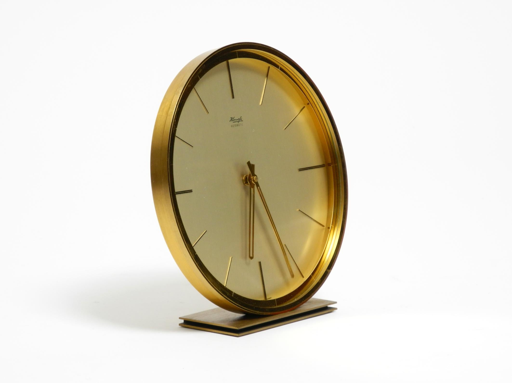 German Beautiful elegant  1960s solid brass table clock by Kienzle with original box For Sale