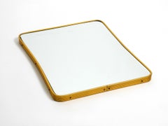 Beautiful Elegant Italian Mid-Century Modern Wall Mirror with a Brass Frame