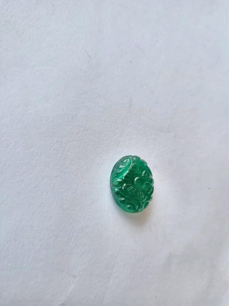 Elegant Emerald Carving Oval Cut Gemstone.
9.45 Carat with a elegant Green color and excellent clarity. Also has an excellent fancy Oval cut with ideal polish to show great shine and color . It will look authentic in jewellery. The dimensions of the