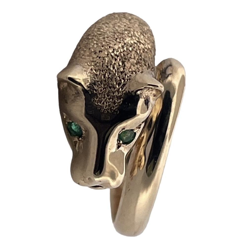 Introducing our captivating masterpiece, the 'Beautiful Emerald Eyes Cheetah' ring, a true testament to grace and strength. Crafted in solid 14K yellow gold, this striking ring features a majestic cheetah design, its form imbued with power and