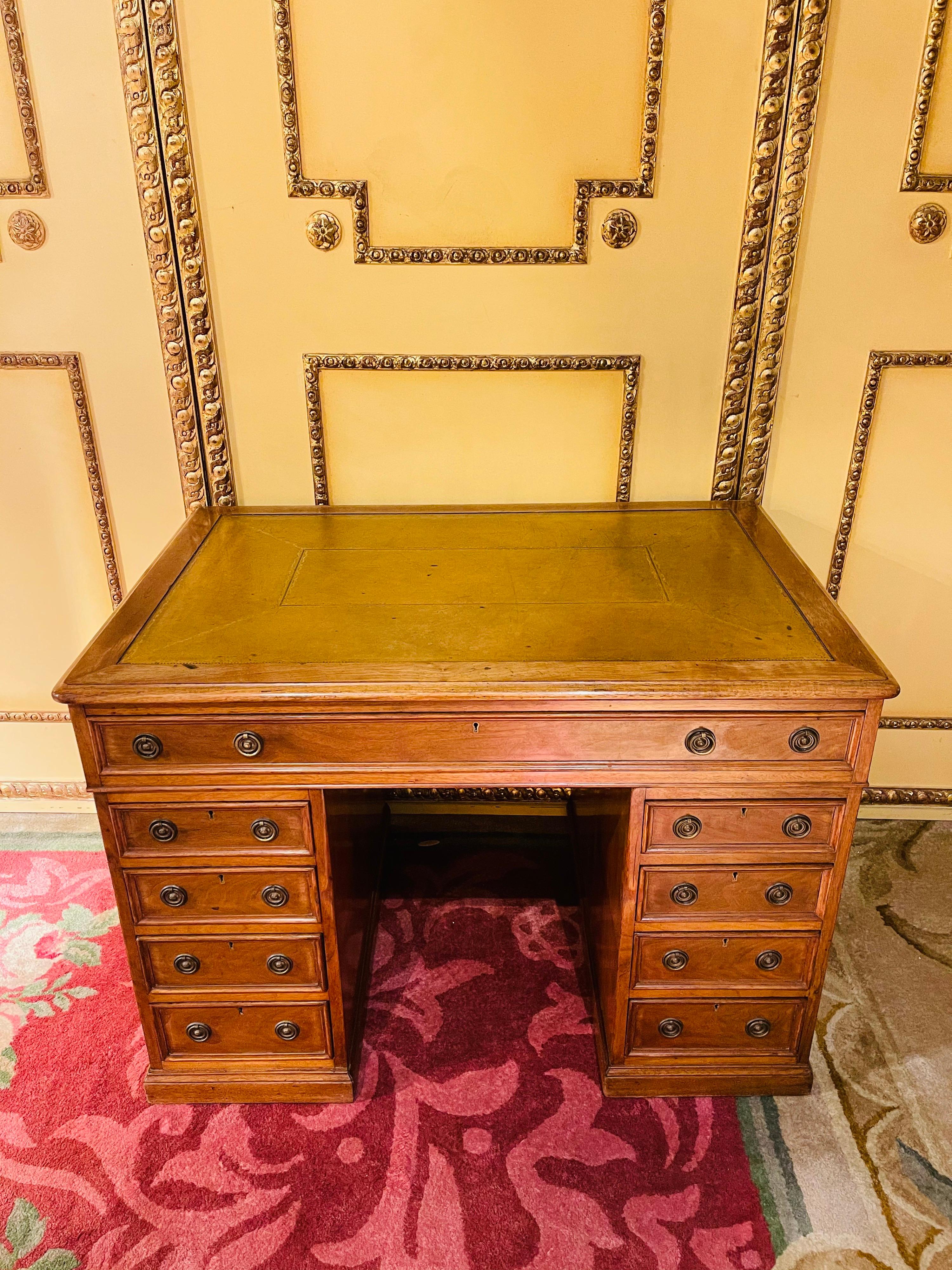 Beautiful English desk, light mahogany 19th century

Classic English desk with real leather top. 3 parts - writing surface + 2 drawer containers. Solid wood made of light mahogany and high quality workmanship. 

The desk has a lot of storage