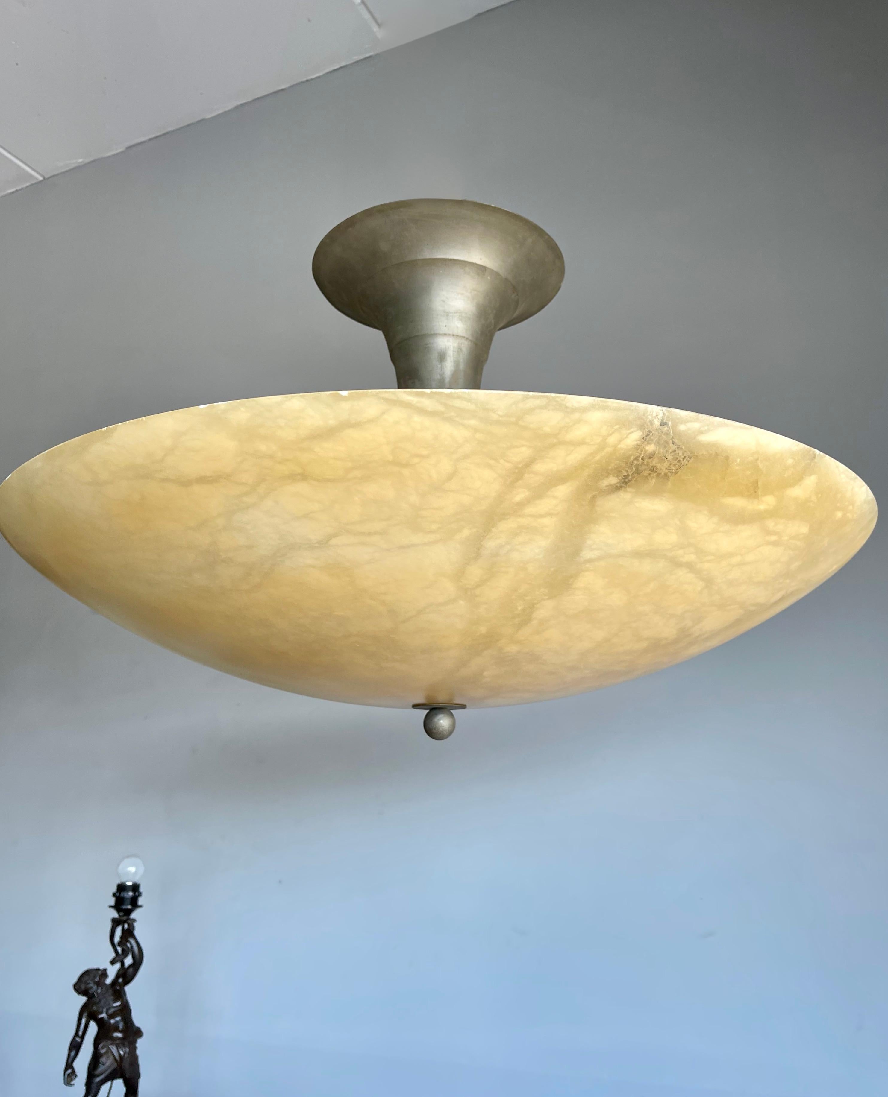 Amazing and impressive late Mindcentury Modern six-light fixture. 

Over the years we have sold a number of beautiful and timeless alabaster light fixtures, but we had never even seen an alabaster fixture of this enormous size. 
For it to have found