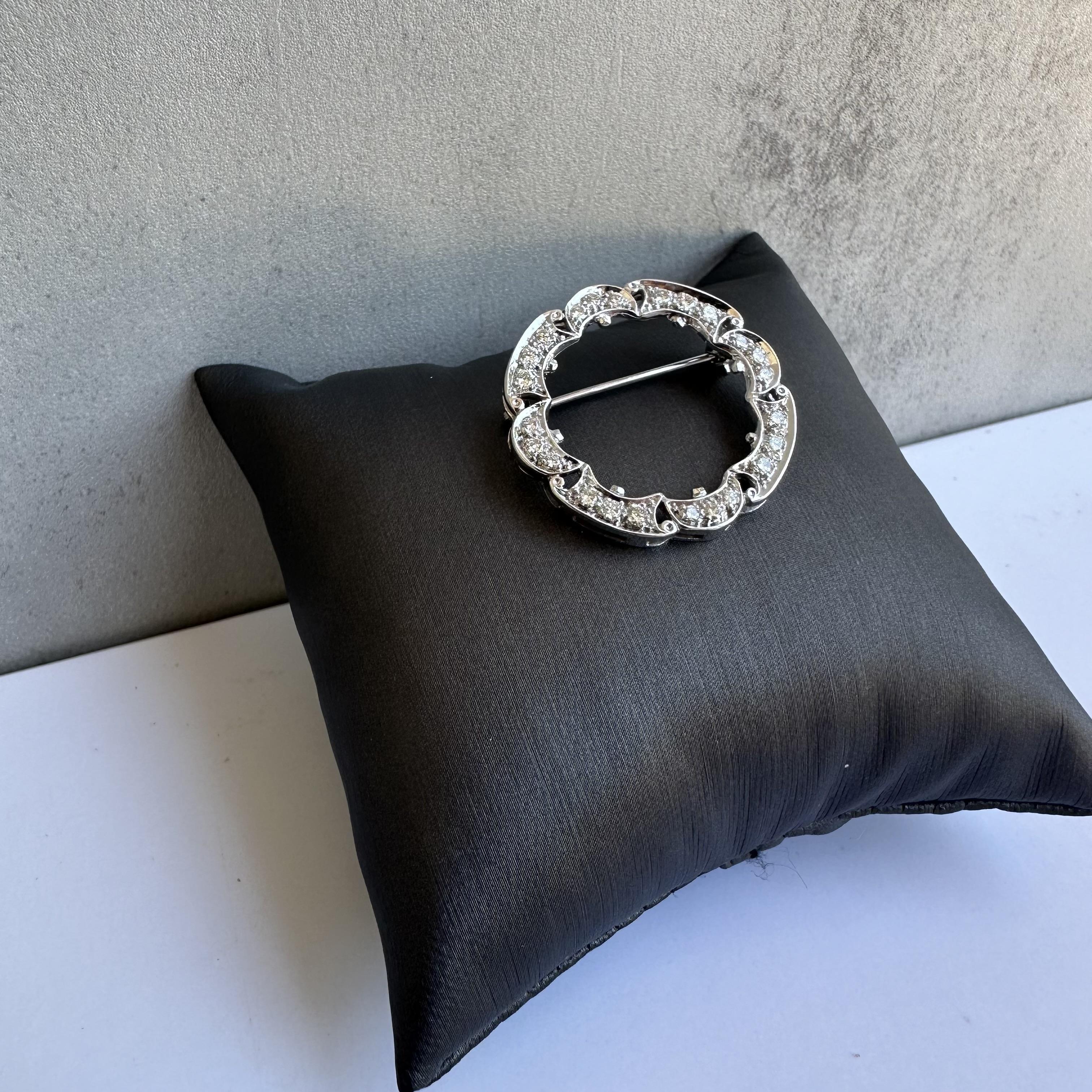 Add a touch of vintage elegance to your jewelry collection with this Beautiful Estate Diamond Brooch in 14kt White Gold. Featuring 1 carat of GH VS/SI natural round diamonds, this brooch is a stunning piece that radiates sophistication and timeless