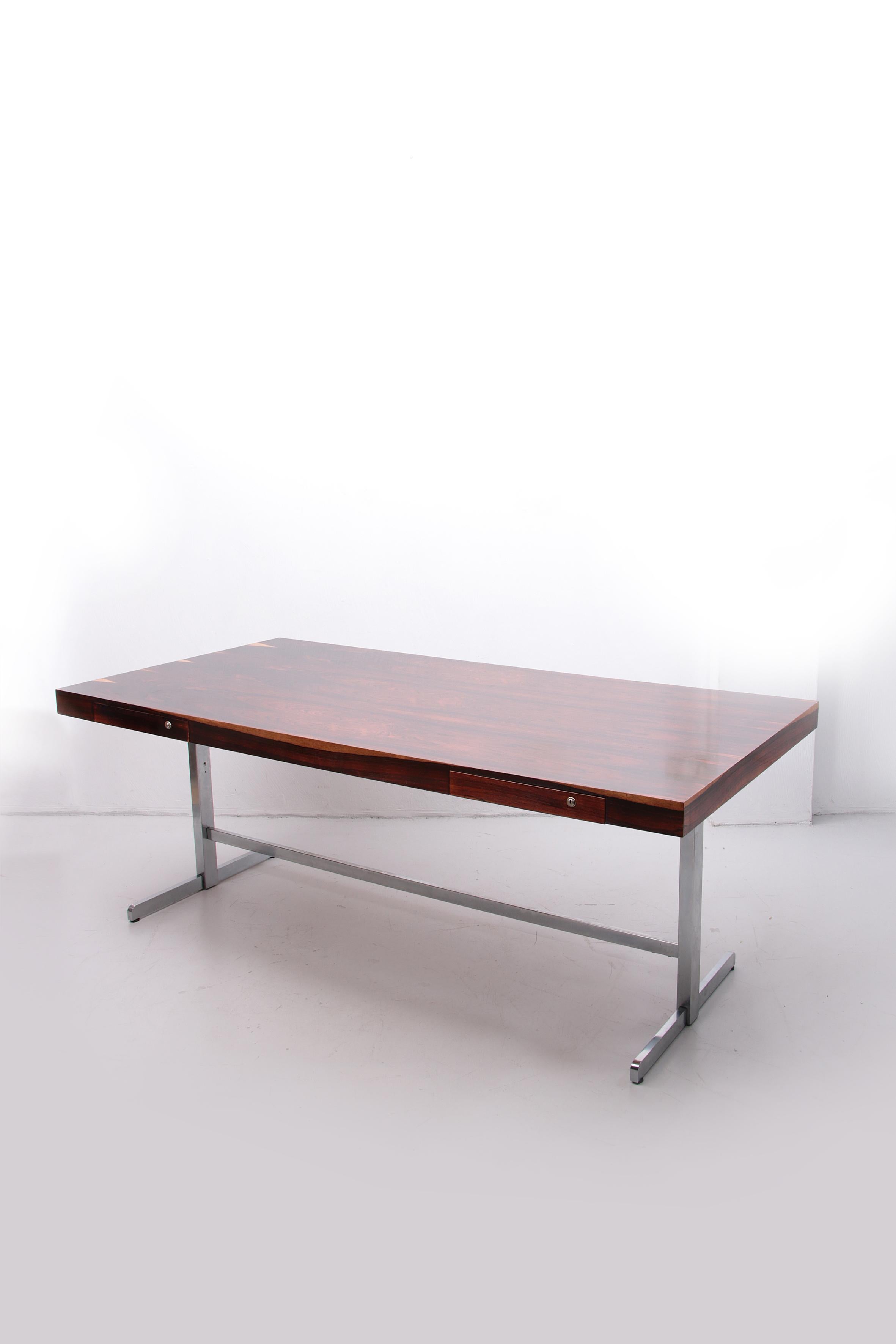 Beautiful desk with two drawers, unfortunately no keys anymore.

The top has been renovated by our furniture maker and repainted, which is why this top is flawless.

Andre Bus designed this desk and it was made by Lane Acclaim.

At the back is