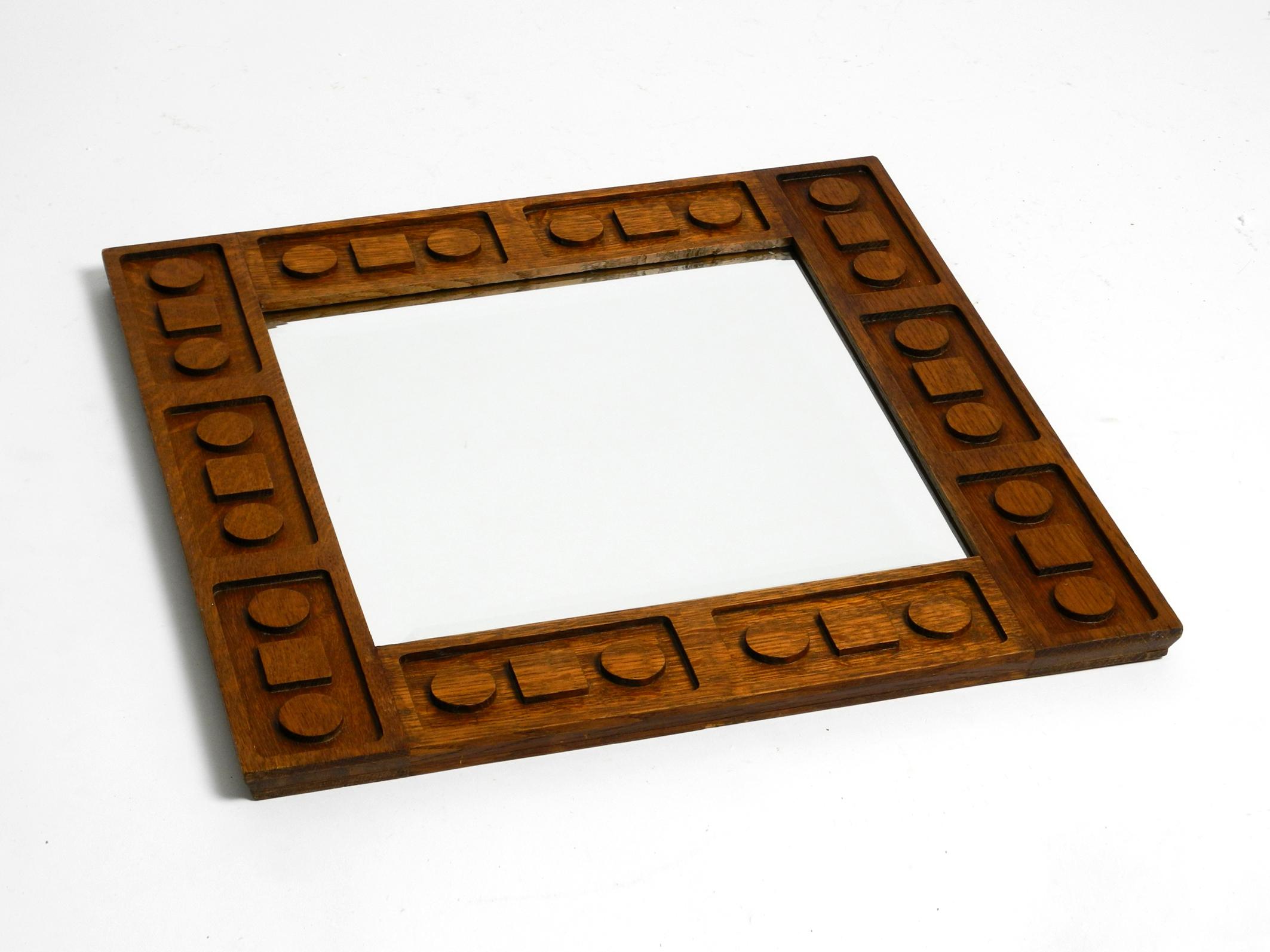 Mid-20th Century Beautiful extraordinary 1930s Art Deco wall mirror made of oak For Sale