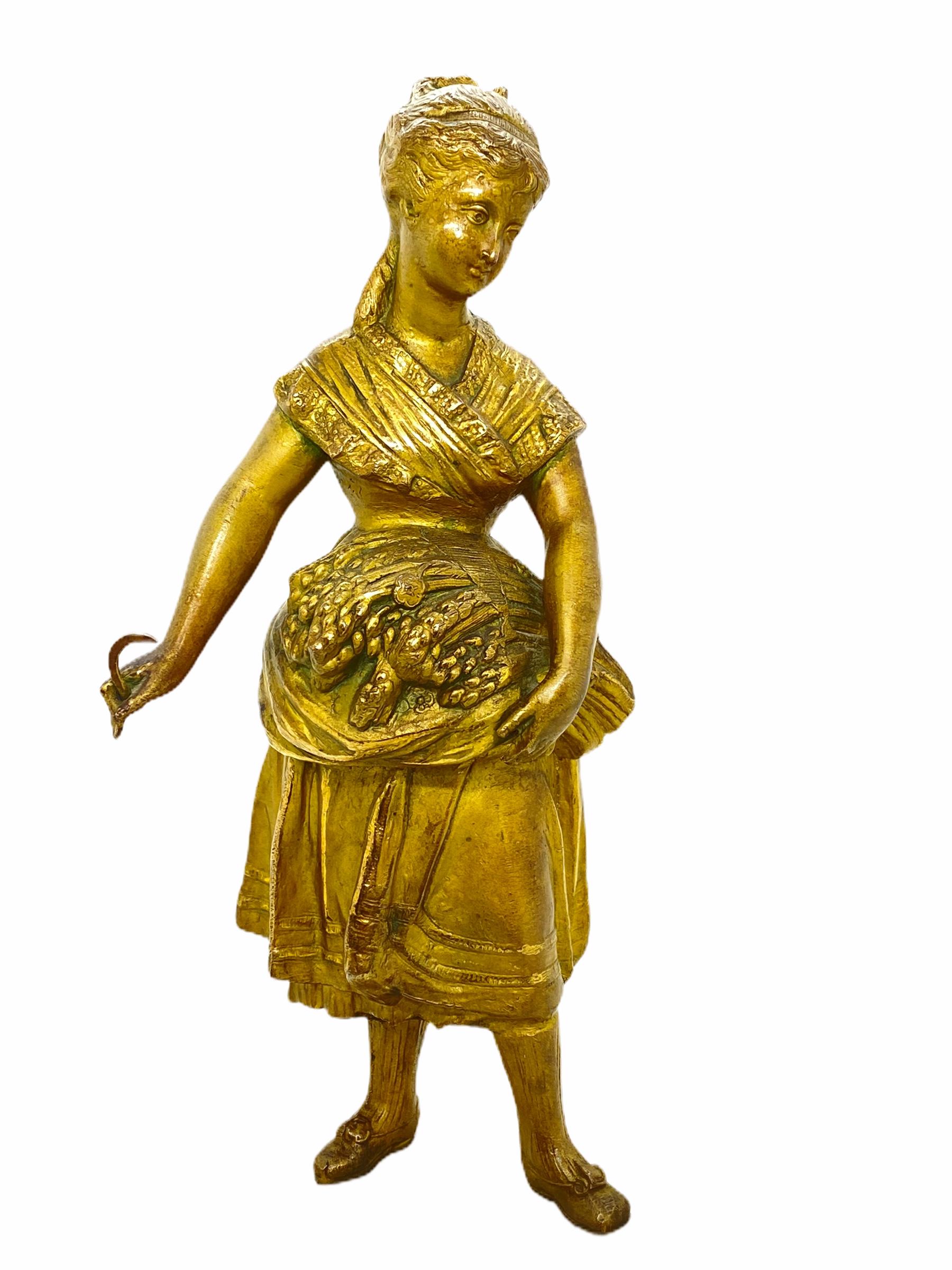A decorative maid sculpture. Some wear with a nice patina, but this is old-age. Made of metal and a marble base. This makes a nice addition to any room.