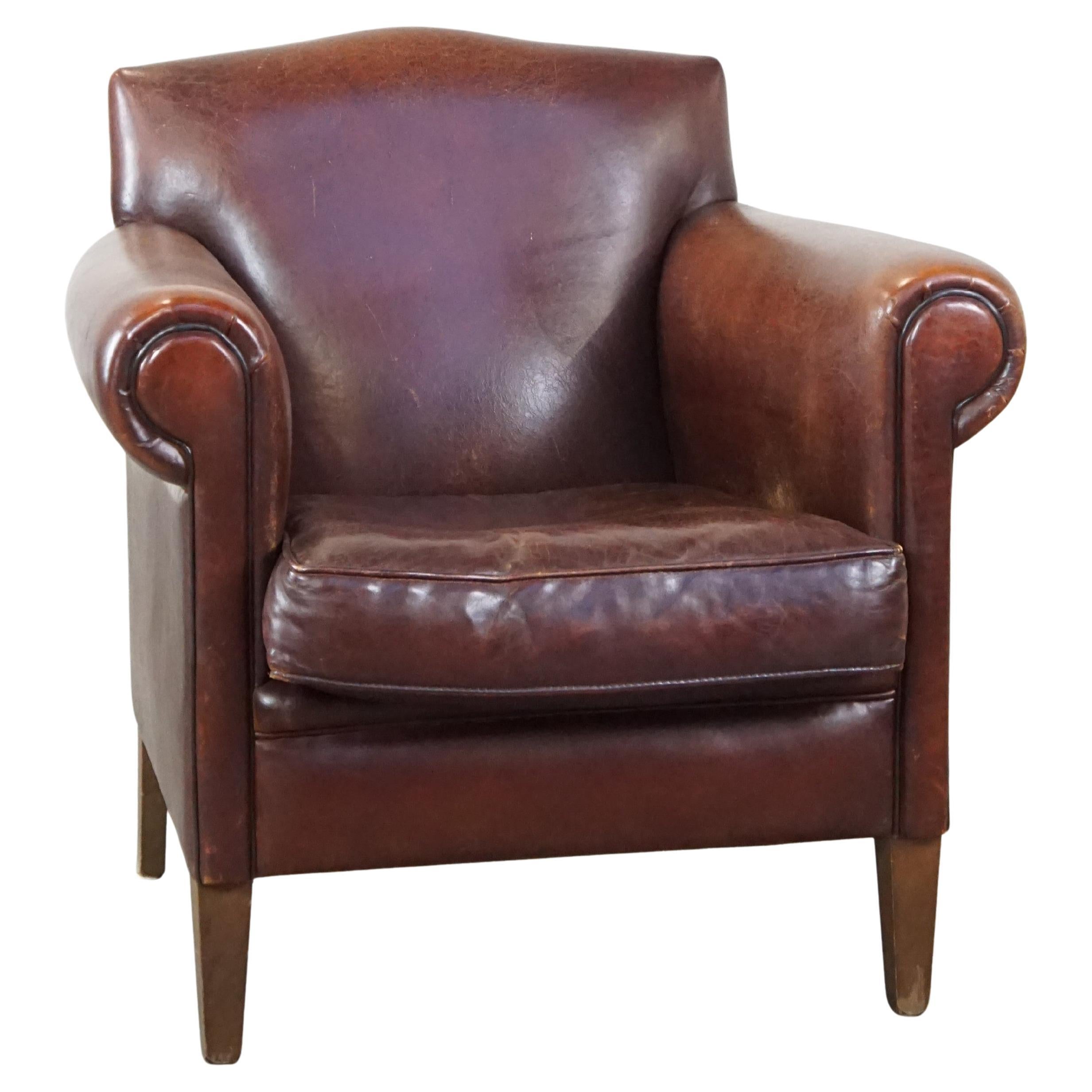 Beautiful, finely finished design armchair made of sheepskin