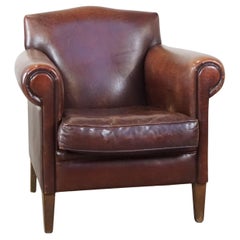Beautiful, finely finished design armchair made of sheepskin