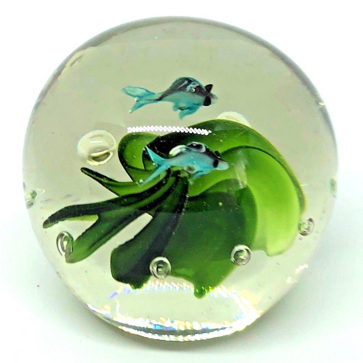 Beautiful Murano hand blown aquarium design Italian art glass paper weight. Showing two fish inside, in different colors, floating on controlled bubbles. Colors are a dark green, light green, blue, black and white. A beautiful nice addition to your