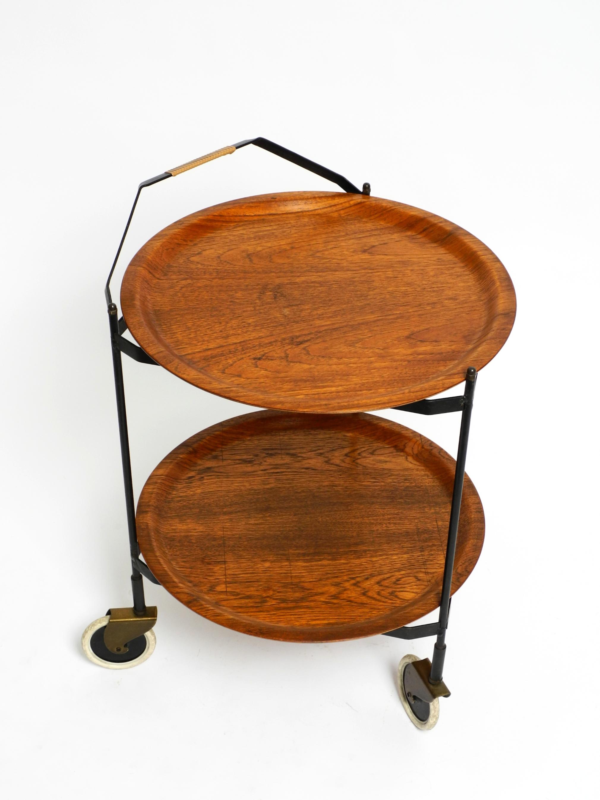 German Beautiful folding Mid Century serving trolley with removable teak pagwood trays For Sale