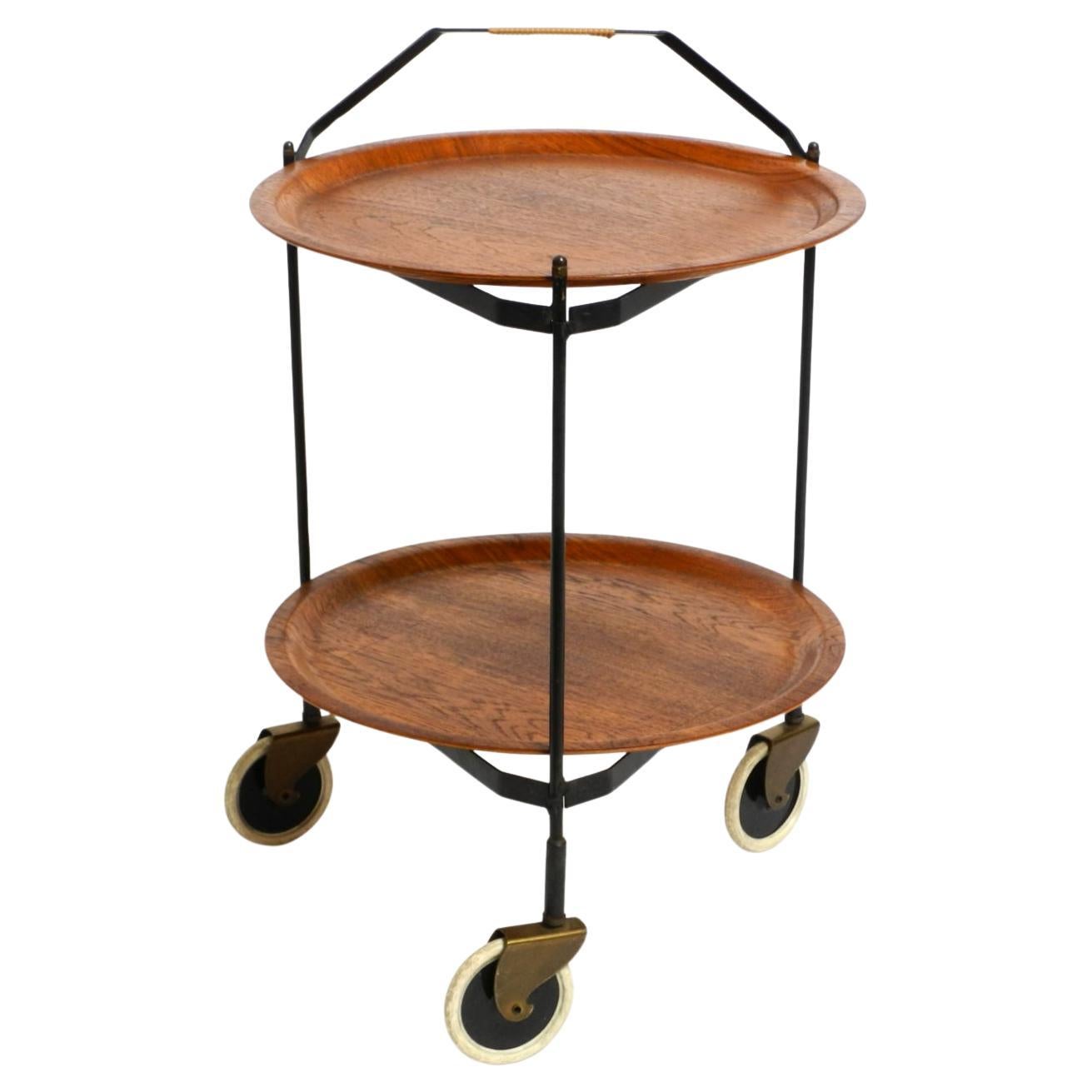 Precioso carro de servicio plegable Mid Century con bandejas extraíbles de madera de teca pagwood
