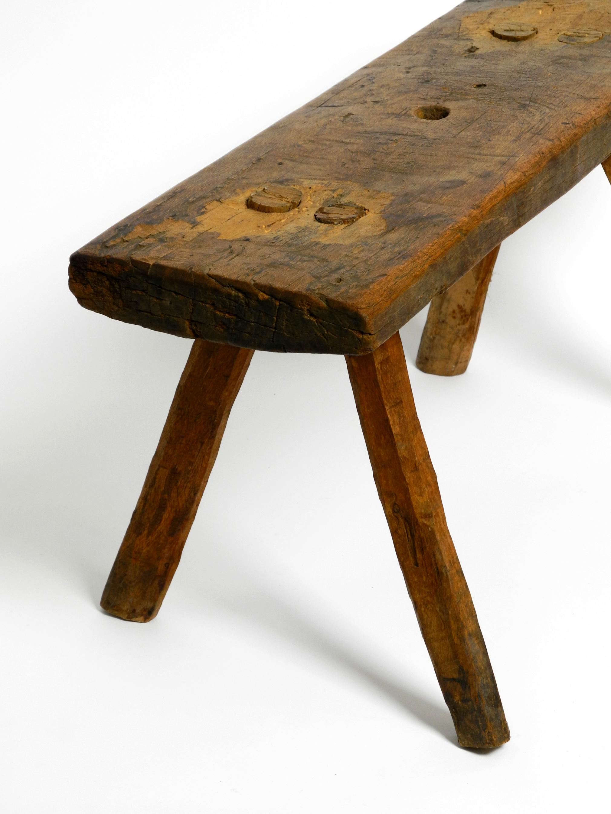 Beautiful Four-Legged Mid Century Solid Wood Stool with a Gorgeous Patina For Sale 4