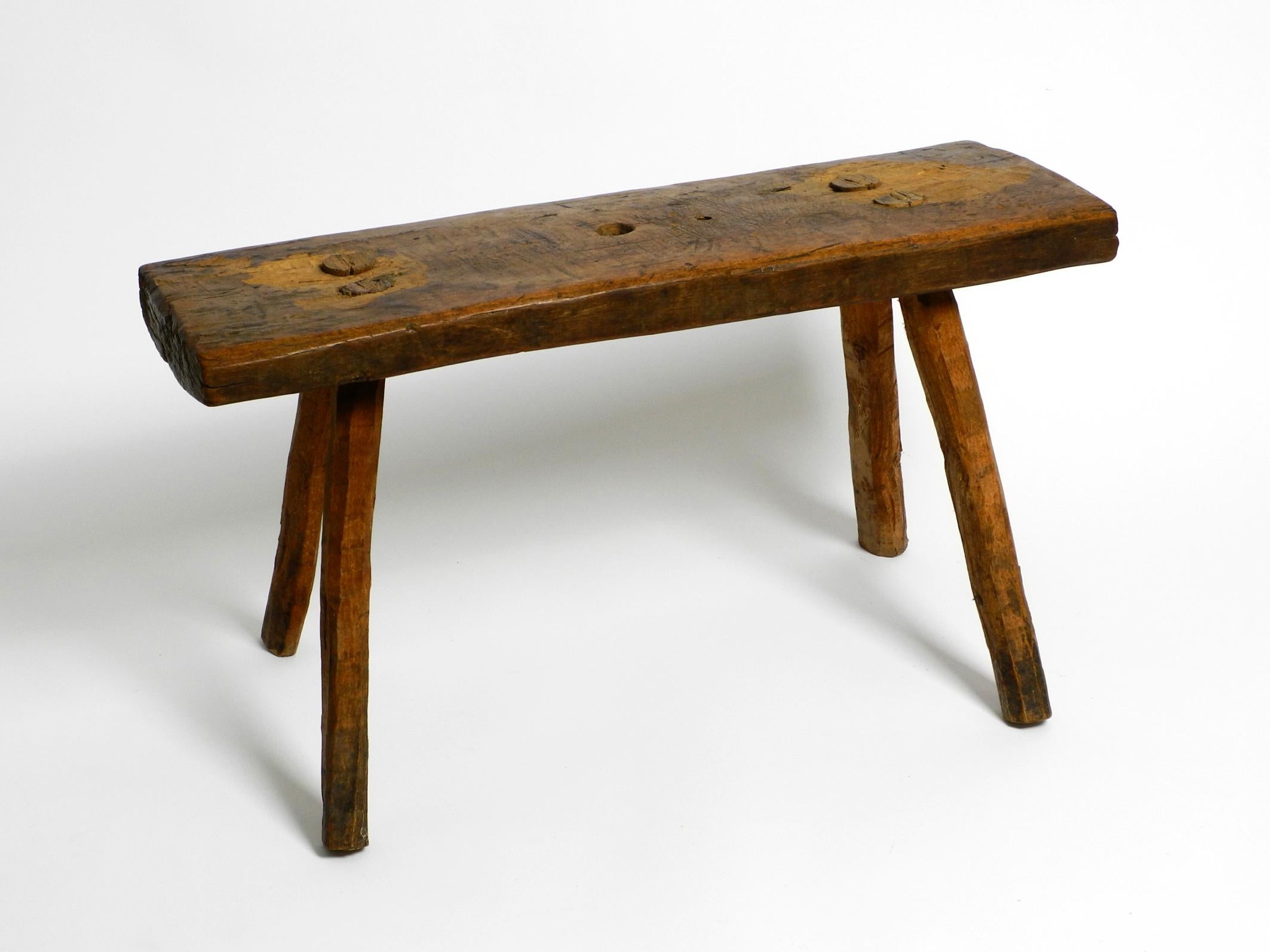 Beautiful Four-Legged Mid Century Solid Wood Stool with a Gorgeous Patina For Sale 10