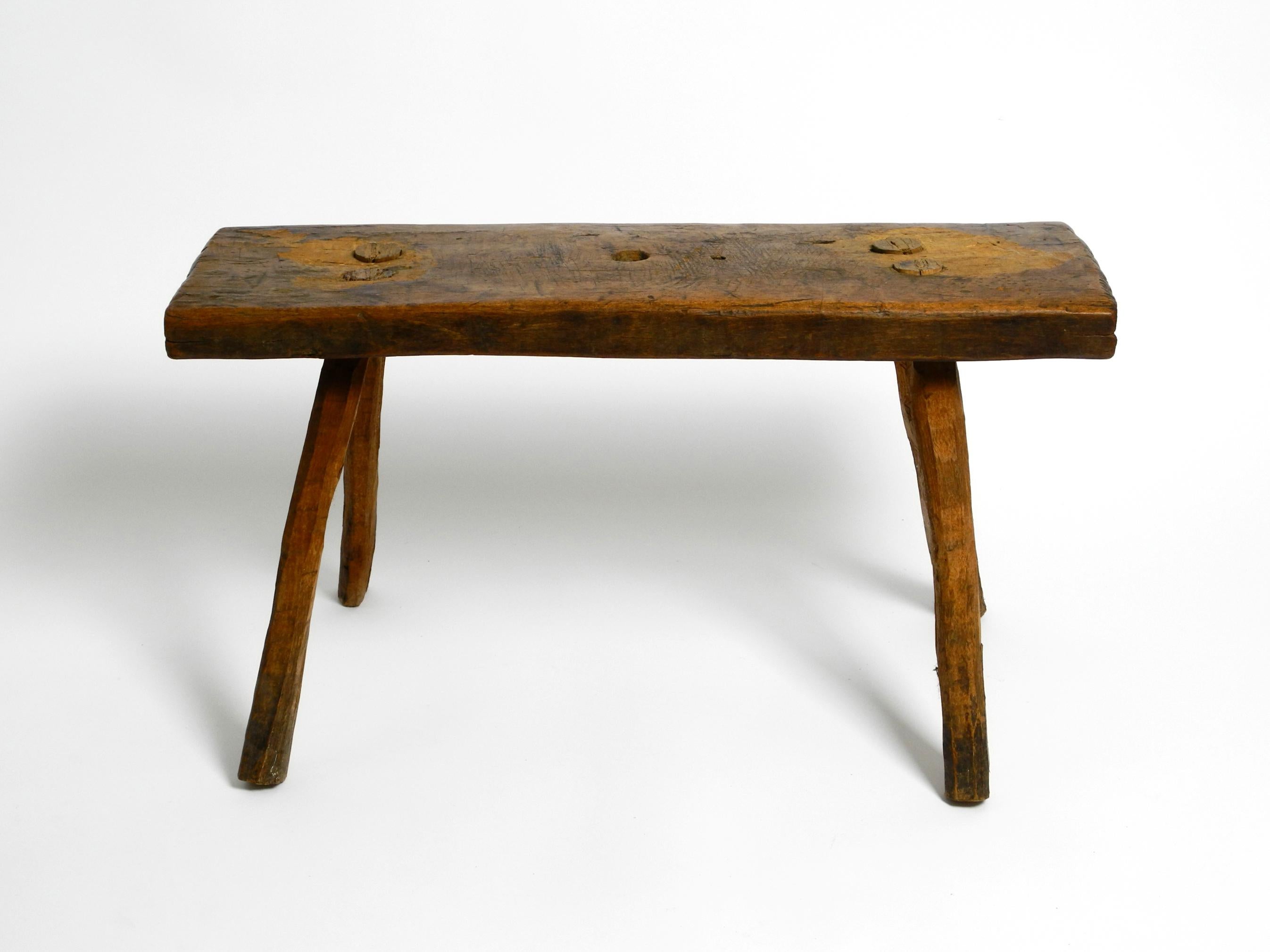 European Beautiful Four-Legged Mid Century Solid Wood Stool with a Gorgeous Patina For Sale