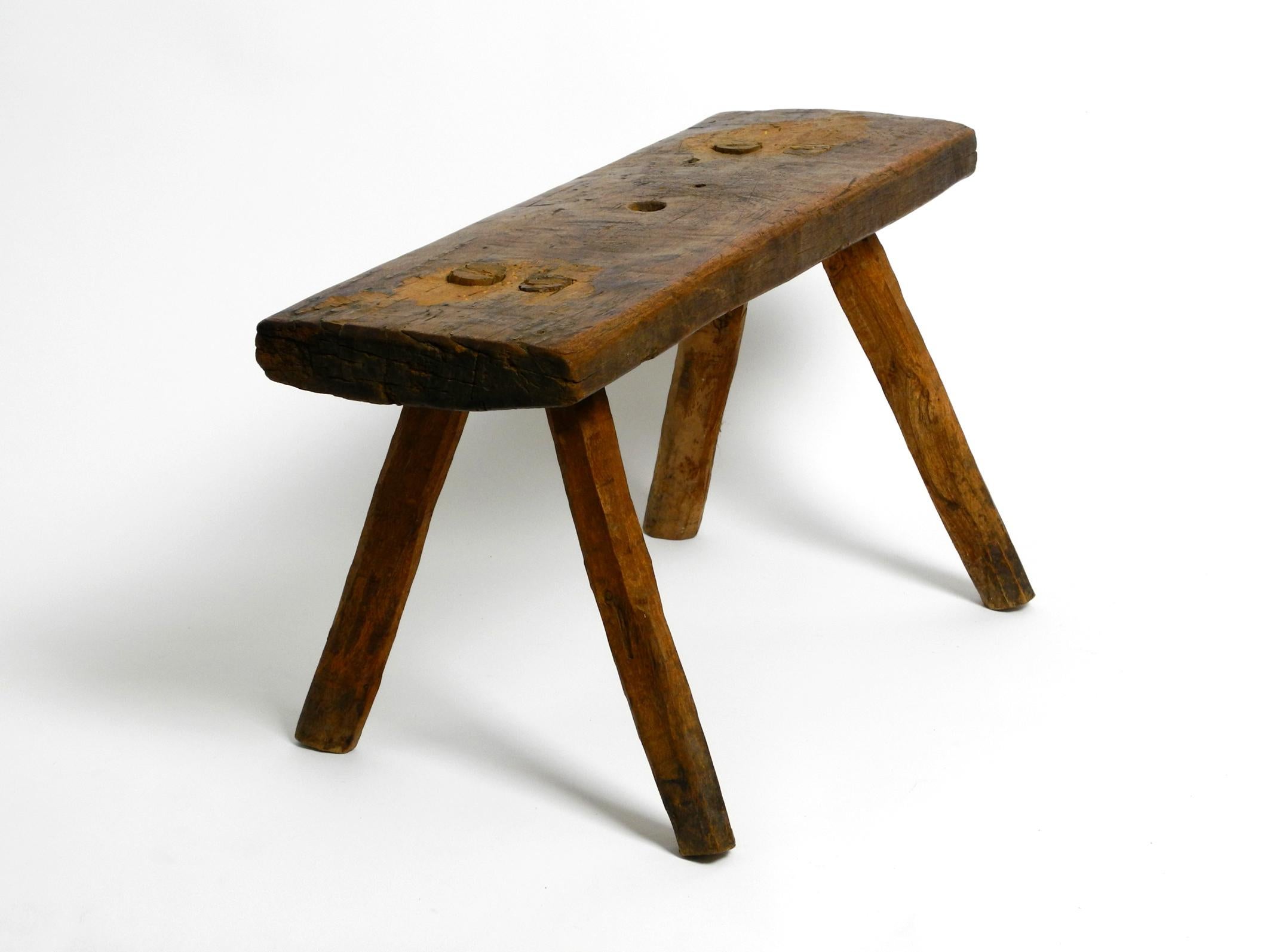 Mid-20th Century Beautiful Four-Legged Mid Century Solid Wood Stool with a Gorgeous Patina For Sale