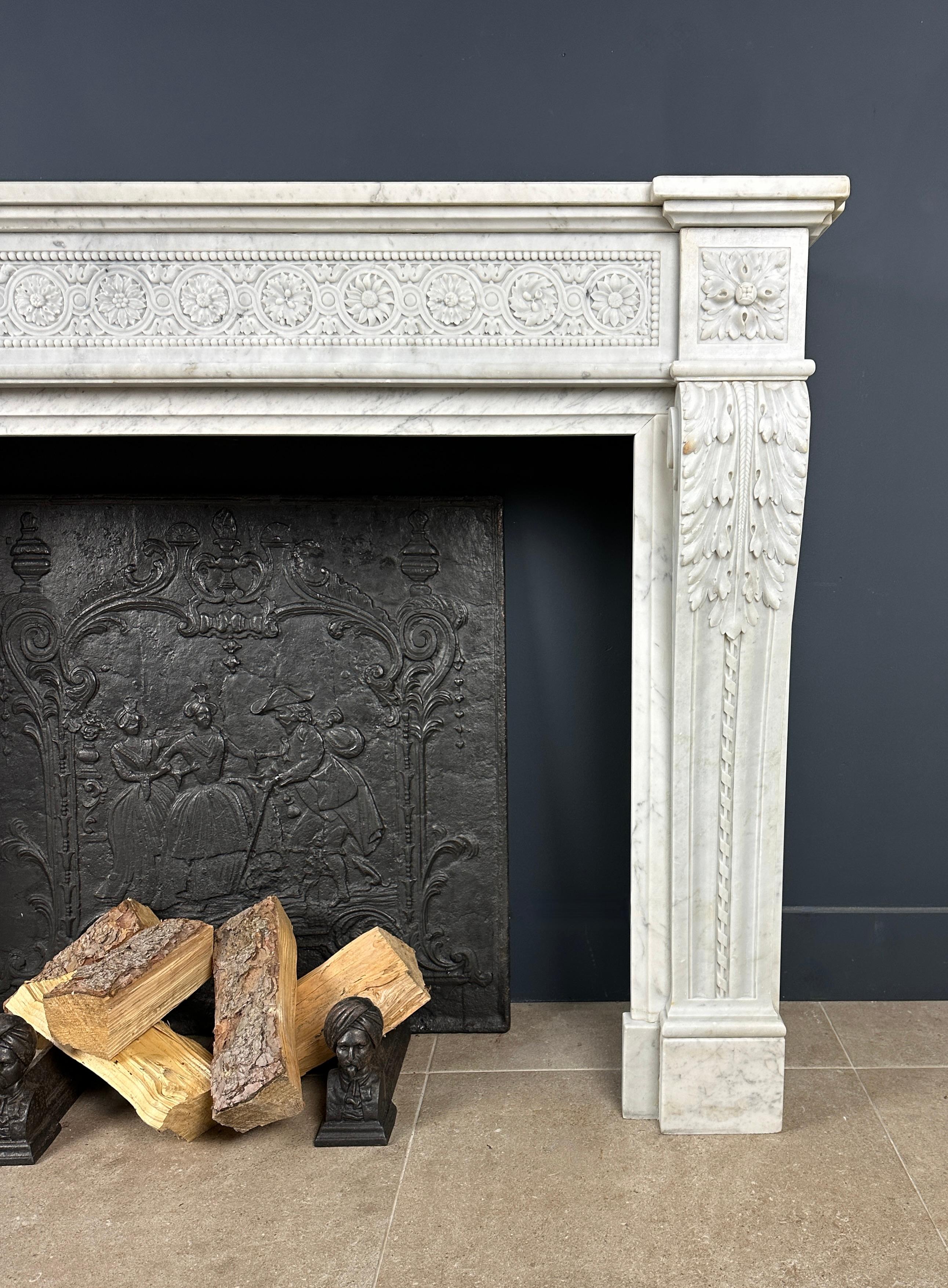 Timeless elegance exudes from this Beautiful French Antique Louis XV Front Fireplace in Carrara Marble. The meticulously profiled front of this fireplace is a masterpiece in itself, with refined details that highlight its stylish appeal.

The