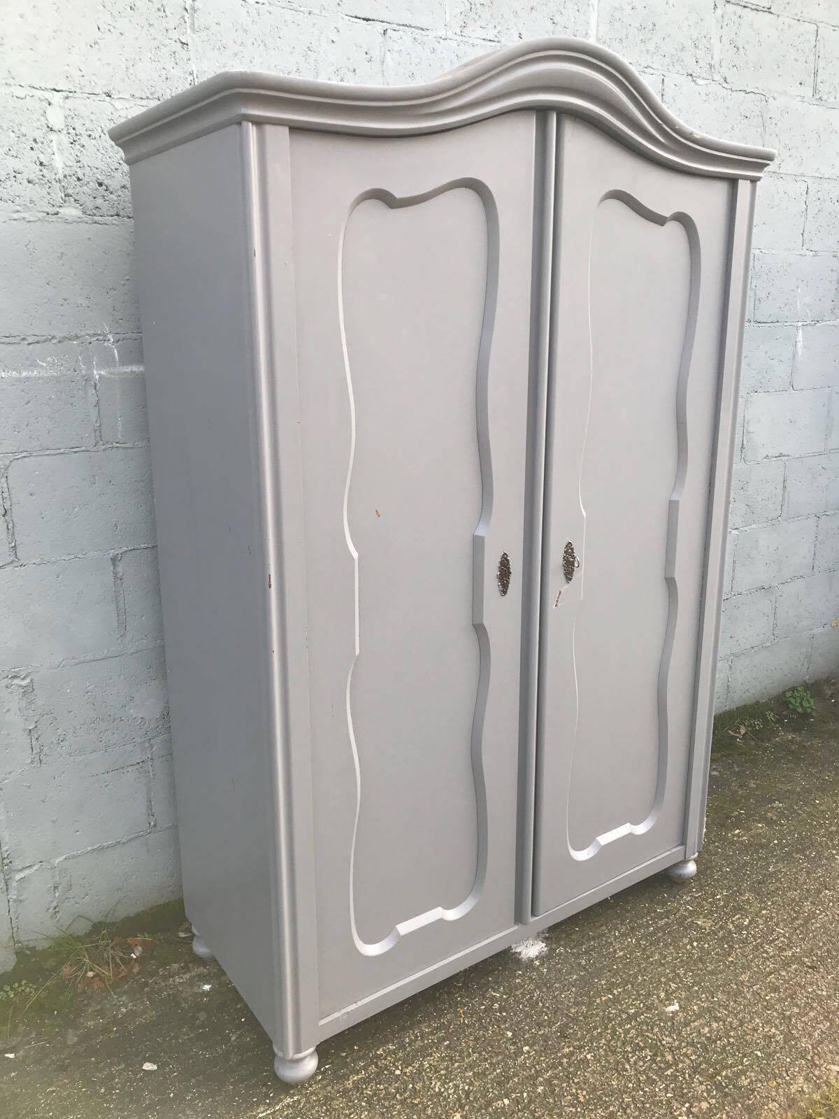 This is a beautiful French larder/cupboard or wardrobe.



It's been painted in grey color, slightly distressed.



Single carved door opens up to good storage. Can be fitted with shelves or hanging rails as an extra, if
