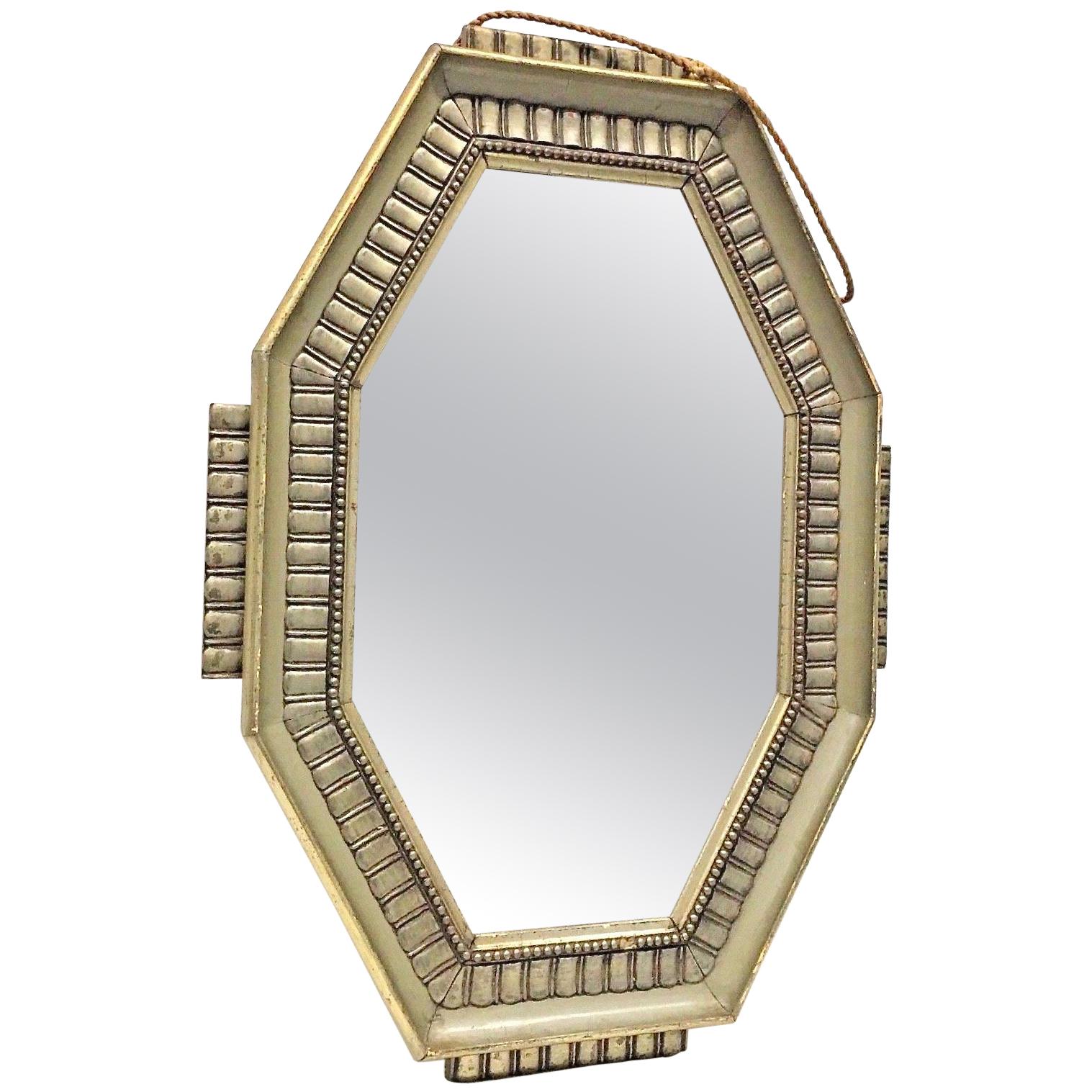 A gorgeous French Art Deco wall mirror. Beautiful wooden frame, original mirror glass. With some signs of wear as expected with age and use. A nice addition to any room.