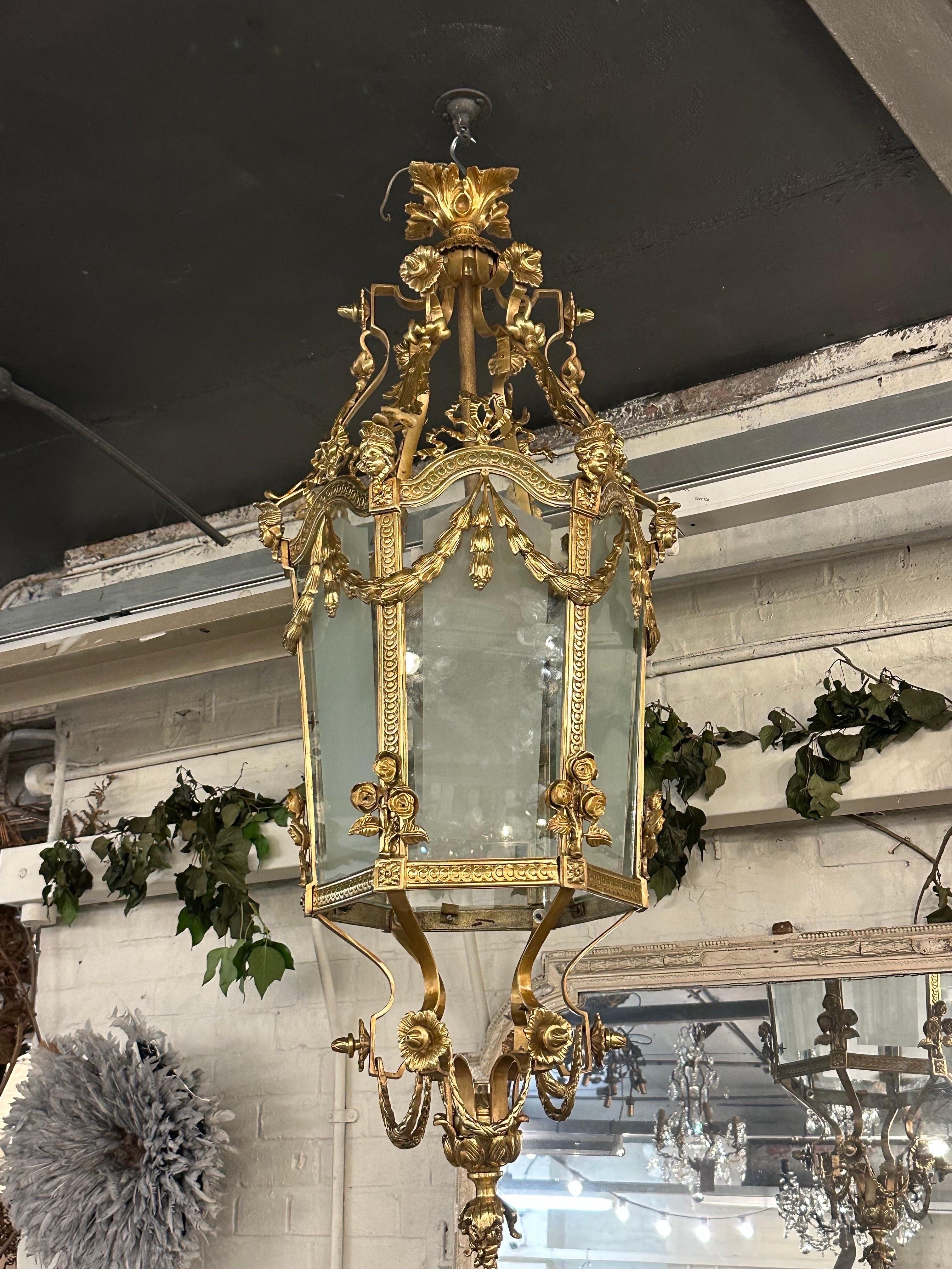 For those with a discerning taste for the extraordinary, we present an exquisite Antique Baroque Bronze Lantern that will transport you to a bygone era of opulence and grandeur. 

This magnificent lantern is a true testament to the beauty and