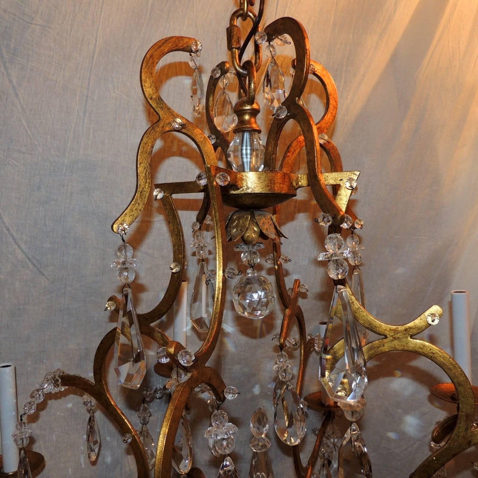 Mid-Century Modern Magnifique lustre français Baguès doré à huit bras en cristal de transition Jansen en vente