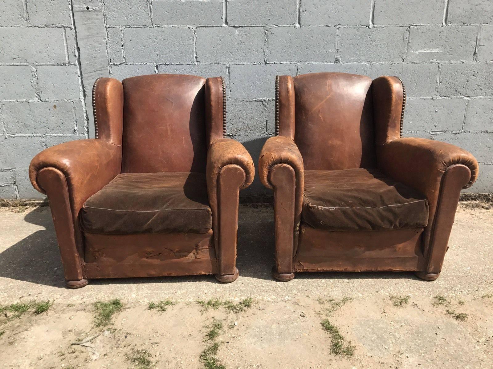 Here we have a beautiful pair of French leather club chairs from the very early 1900s. In fantastic worn condition, but free of any holes or tares.







































 