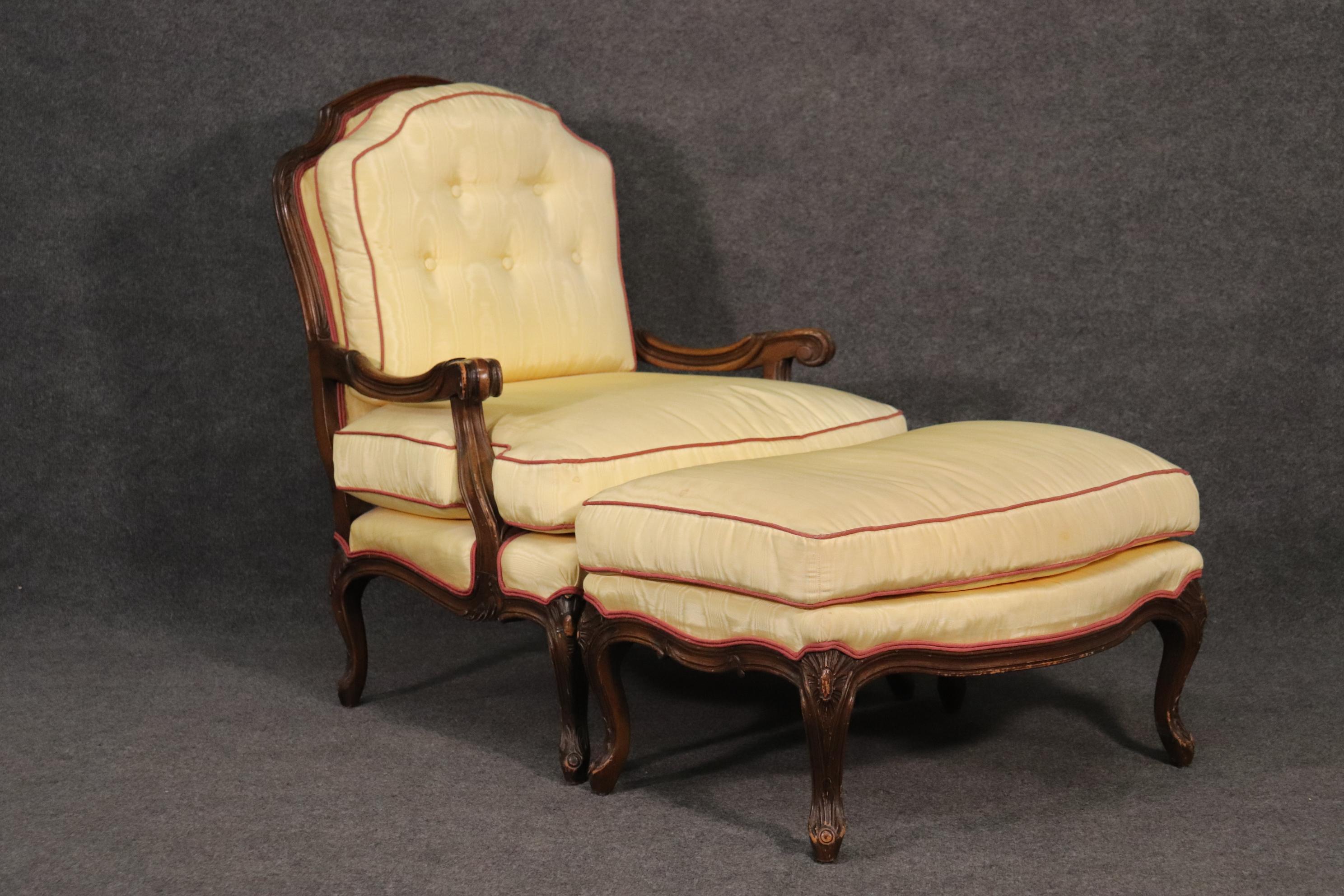 This is a beautiful American-made French style chair. The chair is matched with its own ottoman and is in good original condition. The chair measures 39 tall x 30 wide x 34 deep and the seat height is 19 and the ottoman measures 30 wide x 21 deep x