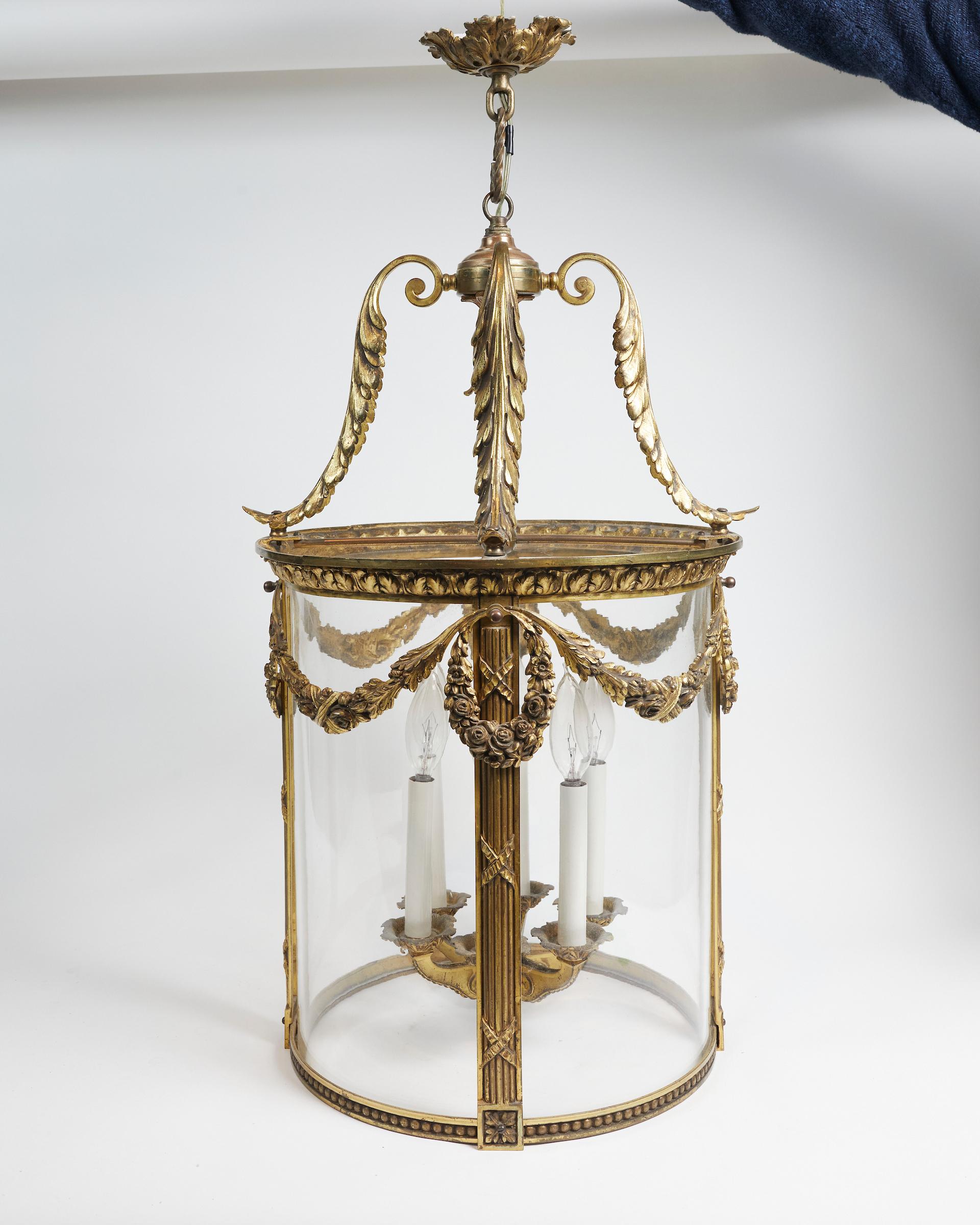 Beautiful French Louis XVI style cast and gilt bronze circular six lights lantern.
Beautiful original gilding and circular glass.