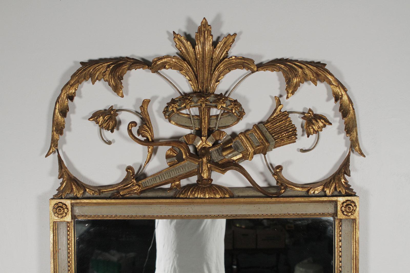 Beautiful French Louis XVI style gold gilt and painted decorative mirror
By Friedman Brothers.