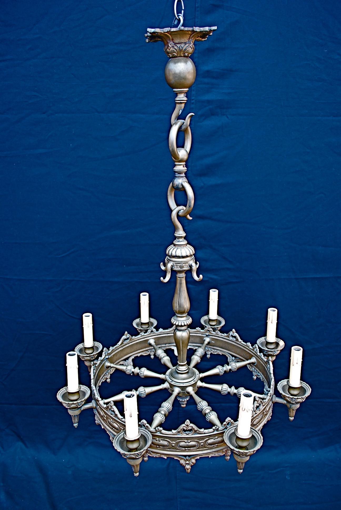 A beautiful and elegant heavy French bronze chandelier, the patina is so much more beautiful in person.

 