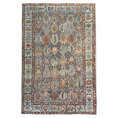 Magnifique tapis persan Bakhtiari ancien au design de jardin