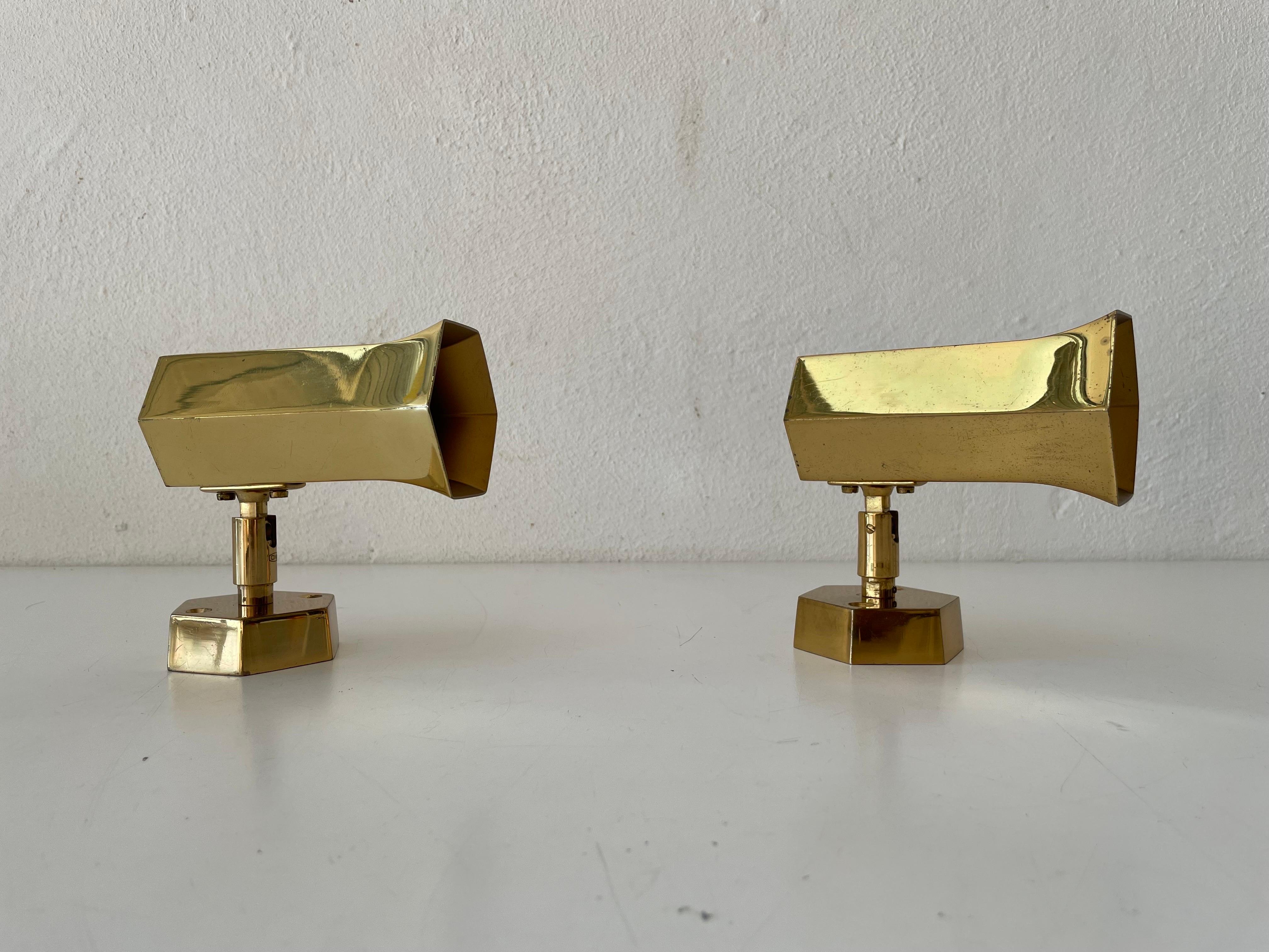Beautiful Geometric Brass Pair of Sconces by Schröder, 1960s, Germany

Very nice high quality wall lamps

Lamps are in very good vintage condition.

These lamps works with E14 standard light bulbs. 
Wired and suitable to use in all countries.