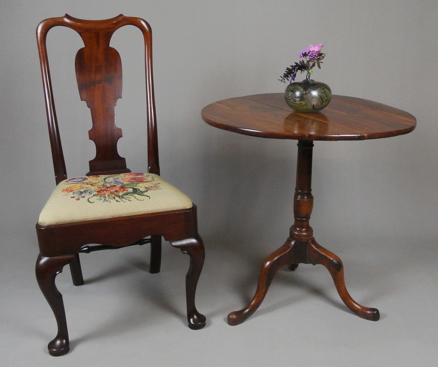 A beautiful George I period side chair with gently curving splat, scrolled ears to the crest and cabriole front legs with carved C scrolls at the knees and set on large puddled pad feet.

In excellent condition and having always been well cared for.