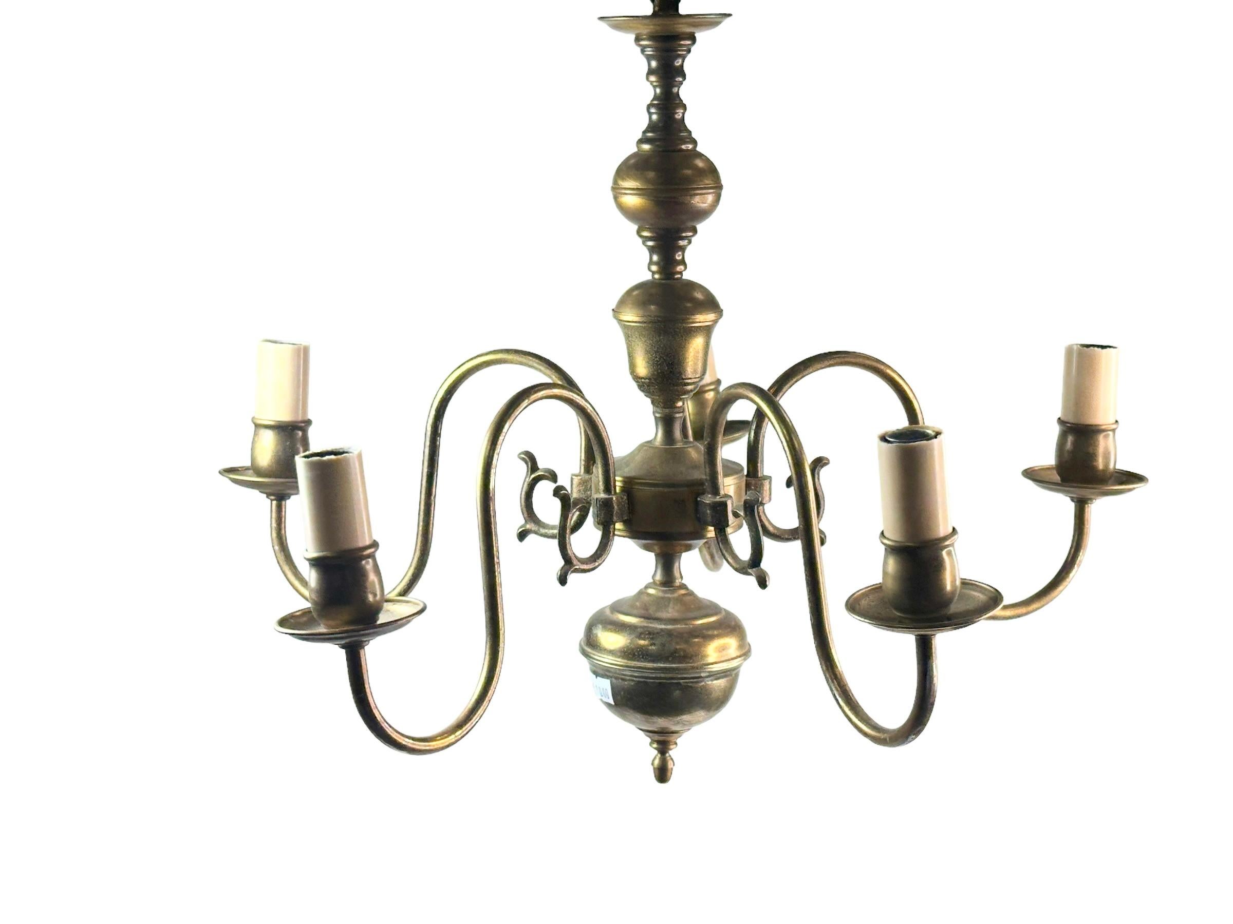 Add a touch of opulence to your home with this charming chandelier! Perfect burnished Metal to enhance any chic or eclectic home. We'd love to see it hanging in an entry hall or in a Living / Dinning room area. Built in the 1950s, attributed to a