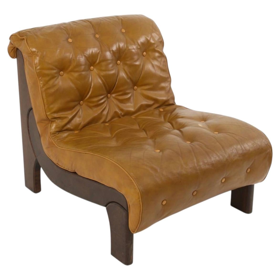 Beautiful German brutalist Tan Leather Oak frame low tufted lounge chair