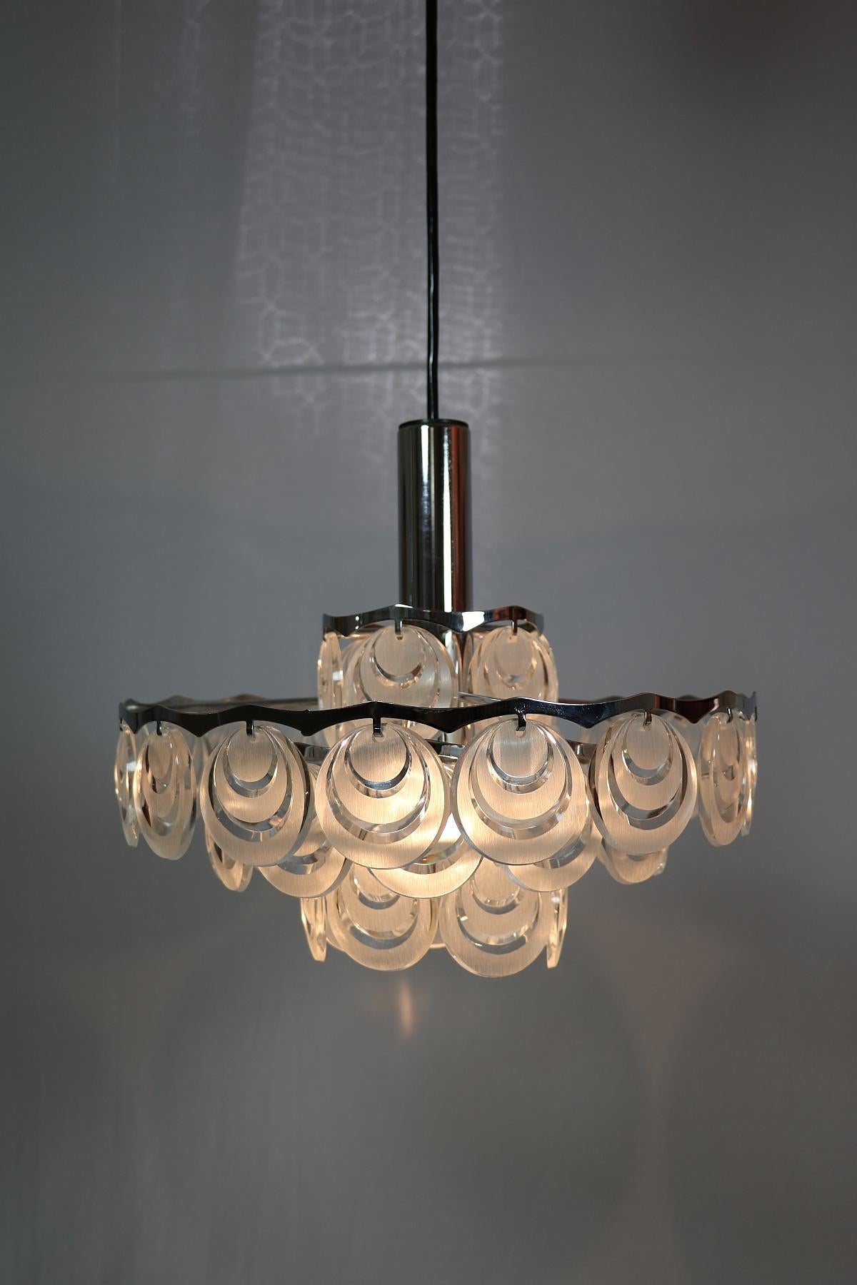 Chrome Beautiful German Chandelier, Original 1970s, discs with relief For Sale