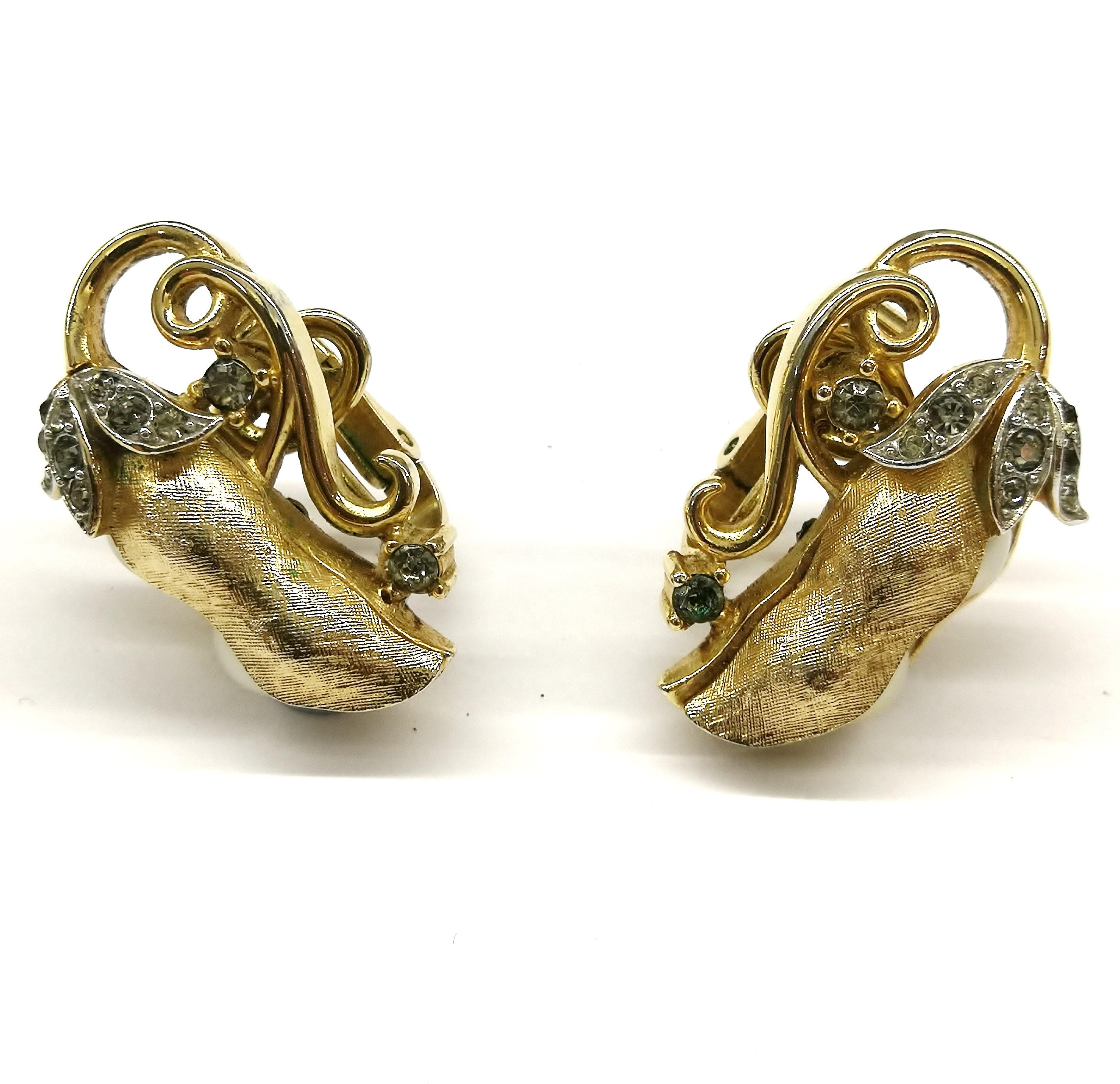 Utterly charming and eye catching earrings, in the form of 'peapods, in a lovely soft gilding, with subtle grey paste and little pearl 'peas' inserted in the casing, from the celebrated American costume jewellery manufacturers, Trifari. Sculpture in