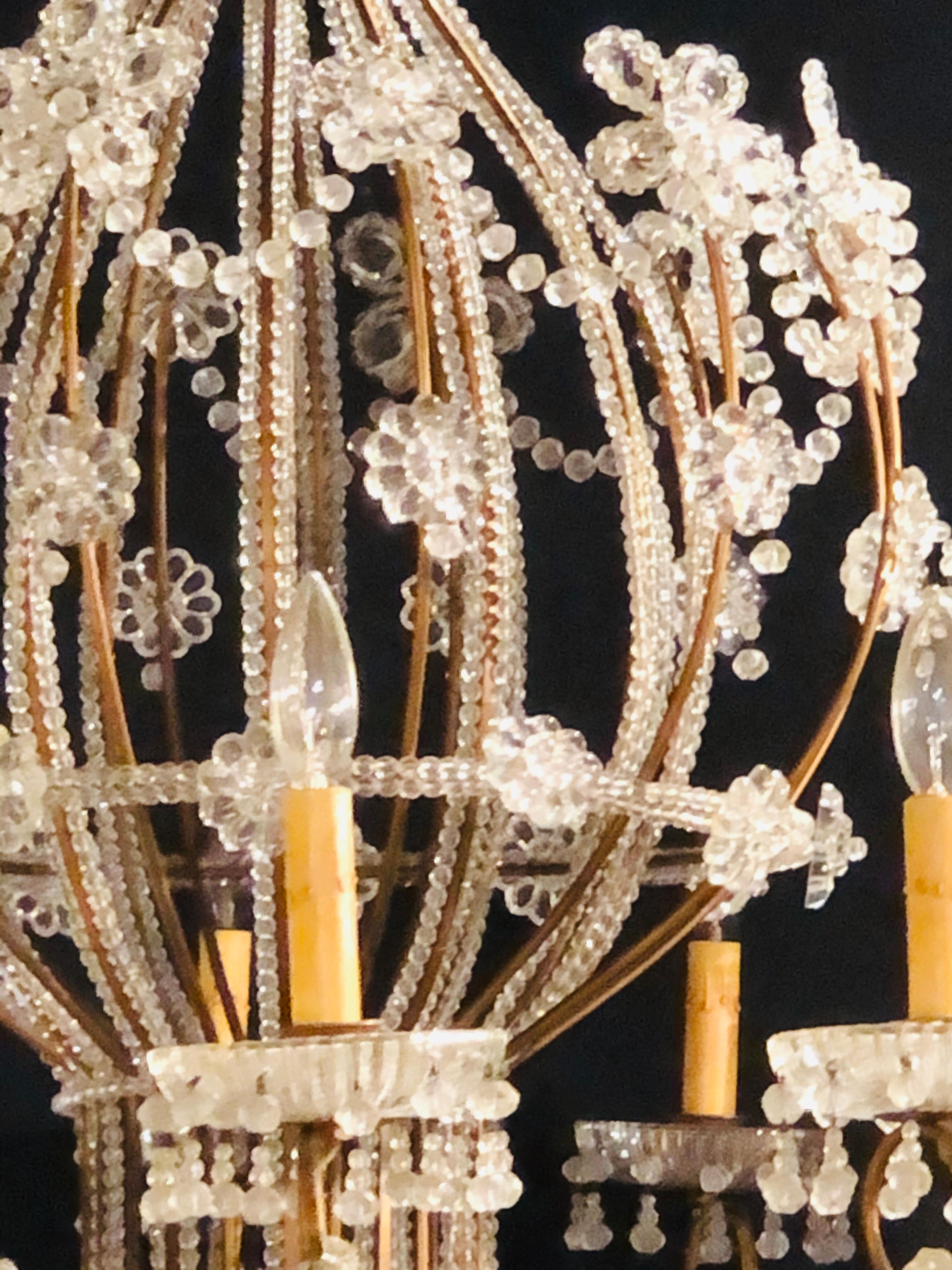 Mid-20th Century Beautiful Gilt Iron 12-Light Chandelier with Great Crystal and Bead Decoration