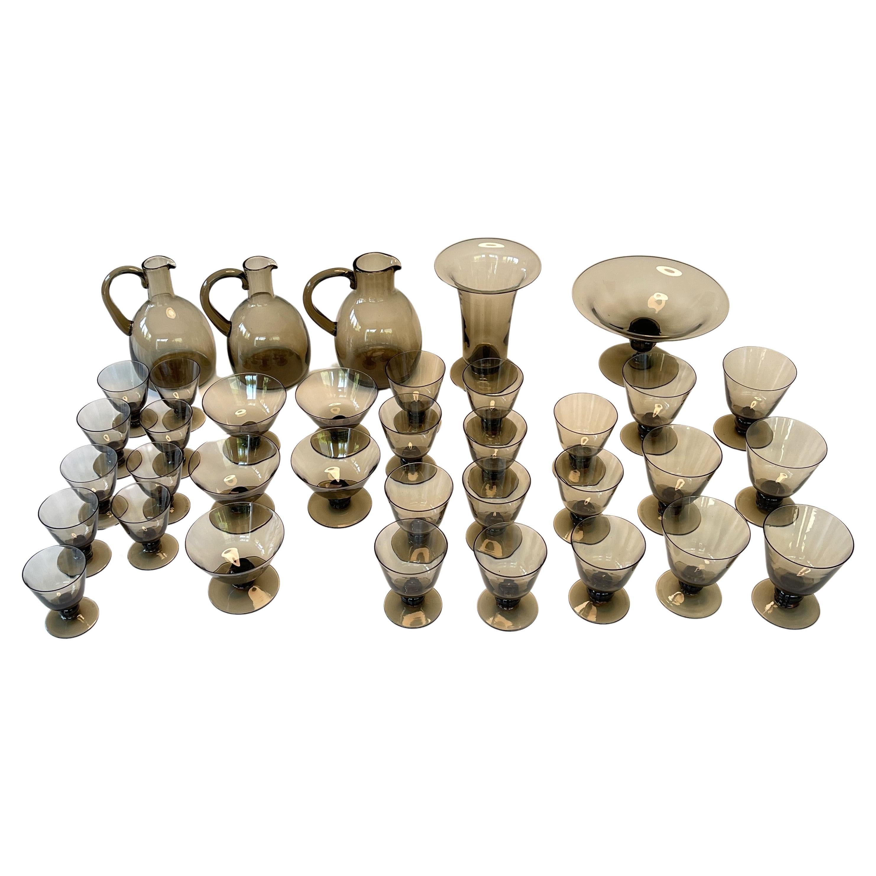 Beautiful glasses set ART DECO signed Daum Nancy smoked glass 36 piece, 1930s For Sale