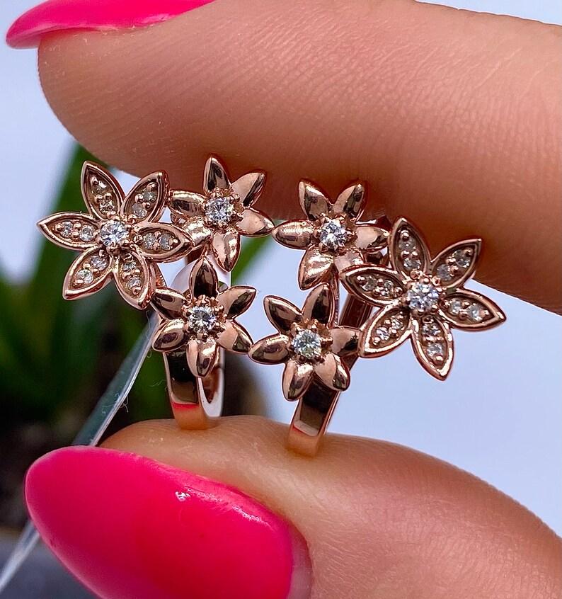 Natural Diamonds
14 Karat Rose Gold Earrings

Main Stone: Diamond
Main Stone Creation: Natural
Main Stone Color: white
Clarity: SI1
Diamond total weight: 0.41ct
Main stone size: 1.5mm and 0.8mm
Earrings Size: 19x15mm
Earrings weight: 4.38gr
Main