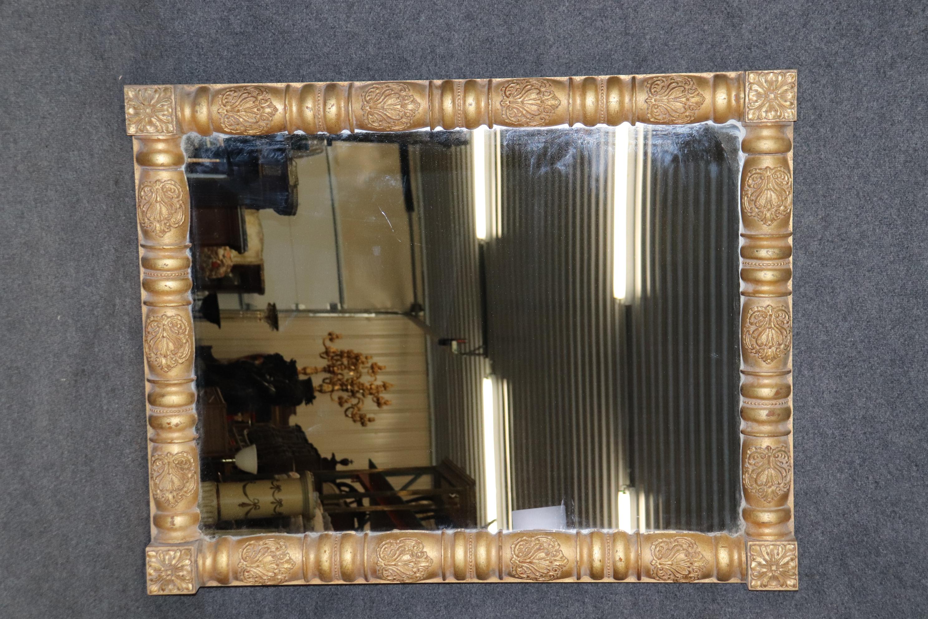 This is a gorgeous mirror by the esteemed company Interiors Inc. The mirror can be hung horizontally or vertically and is already wried this way. The mirror is in good condition with minor signs of age and use but nothing significant. The mirror is