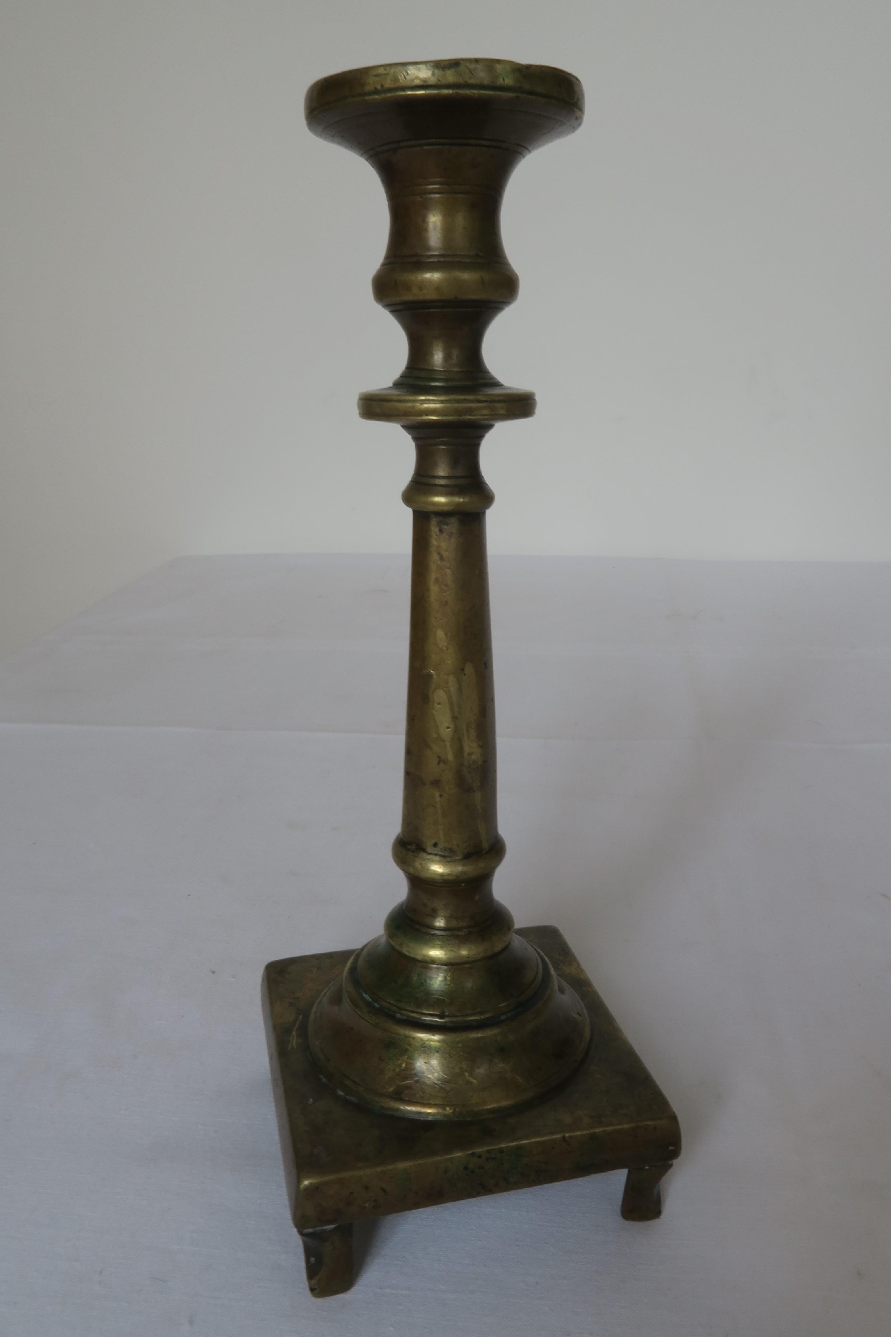 The item on sale is an original Gothic candelabra that dates back to the 1500s. It was expertly handcrafted from brass and consists of two parts that screw onto each other smoothly (see images). The ornaments are reduced and typical for the period.