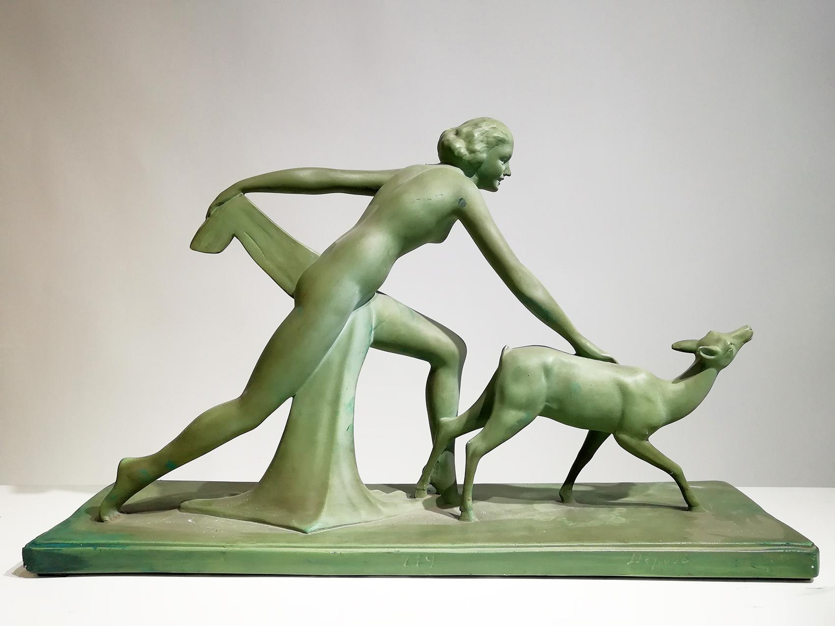 Art Deco terracotta sculpture of a young lady and her fawn in green patina. Signed by the artist on the base.
Salvatore Melani was an Italian impressionist and modern sculptor who was born in 1902.
       