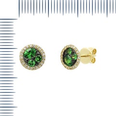 Bellissimi orecchini a cerchio in oro giallo con diamanti e tsavorite verdi