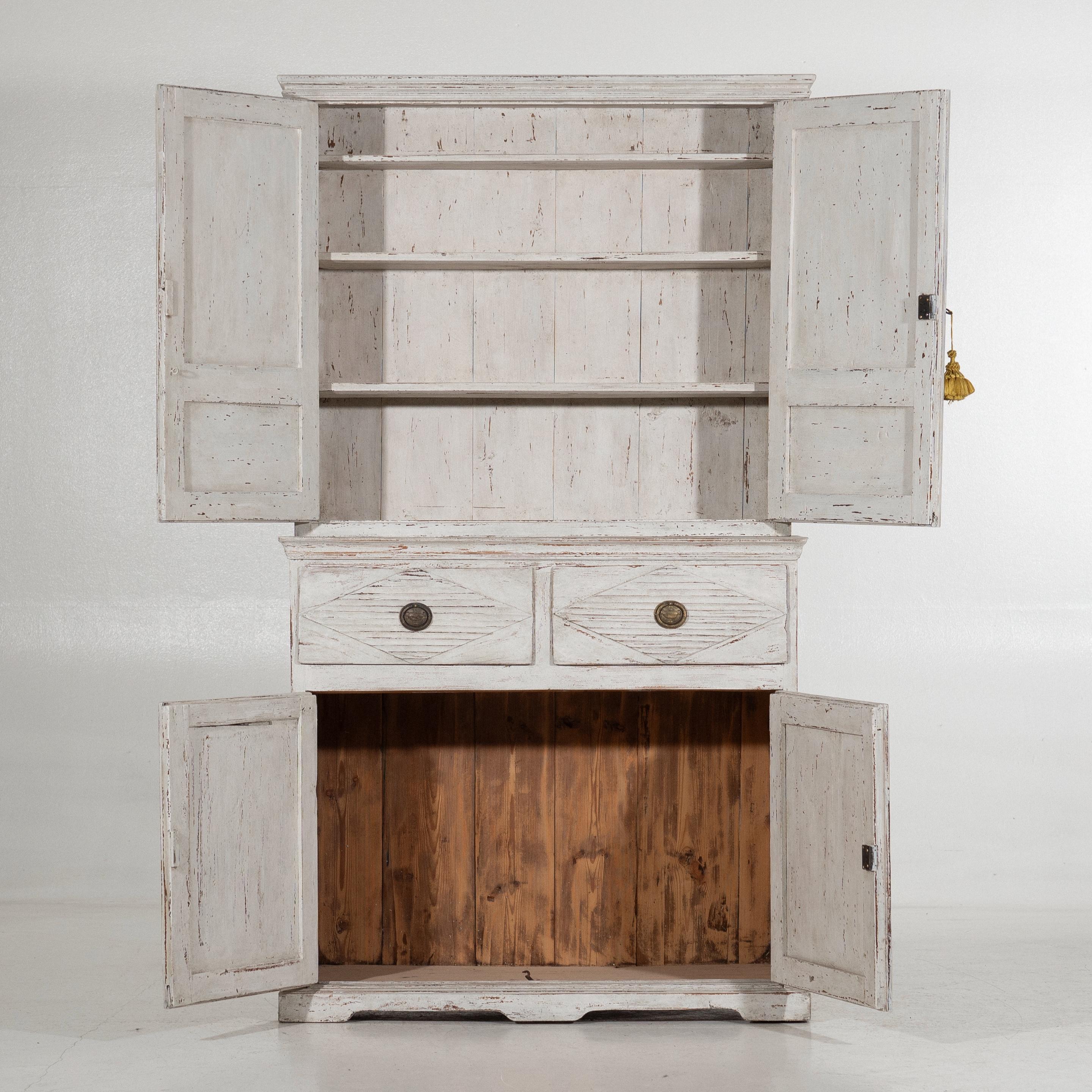 Beautiful Gustavian style cabinet, with carvings and hardware, circa 100 years old.
H. 202 W. 116 D-bottom. 52 D-top. 34 cm.
H. 79.5 W. 45.6 D-bottom. 20.4 D-top. 13.3 in.