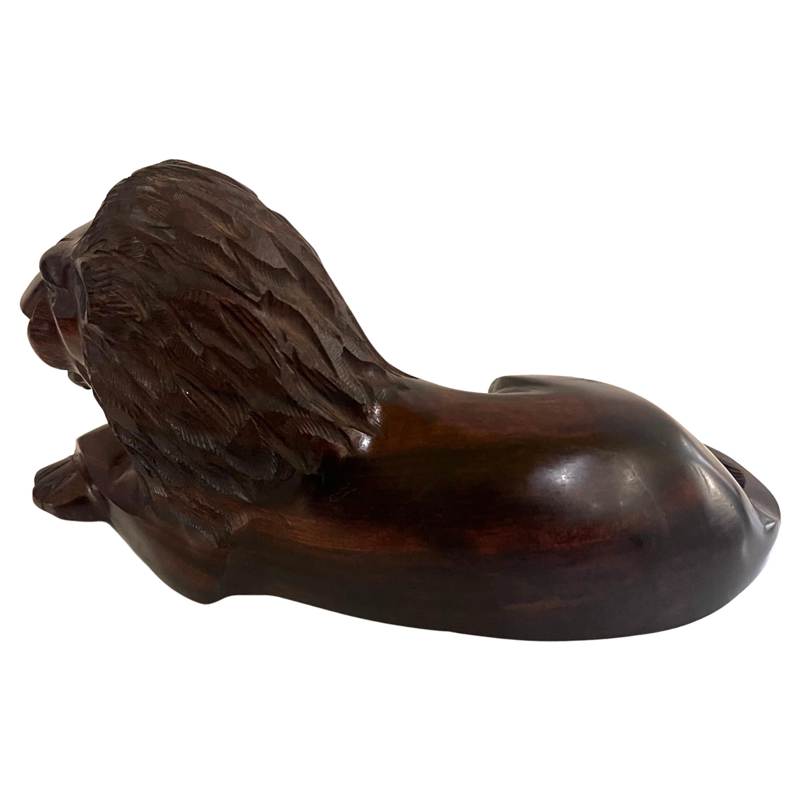 beautiful unique solid hand-carved ironwood lion sculpture with beautiful detail great condition and great subject, circa 1970's.