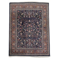 Used Beautiful hand-knotted Indian rug with blue and red floral patterns, measuring