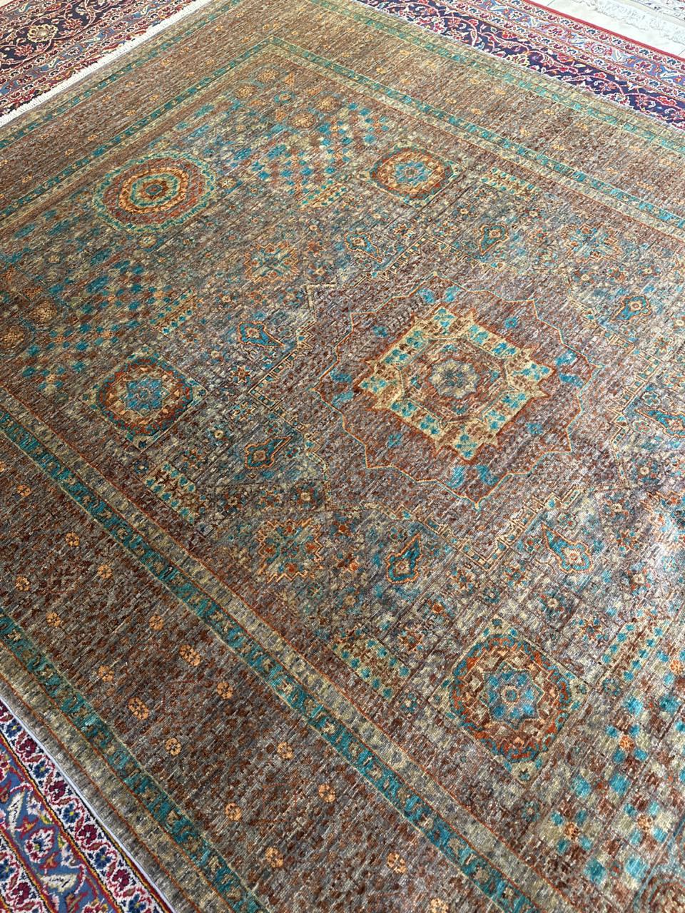 A very unique handmade Wool Rug. This amazing piece is 