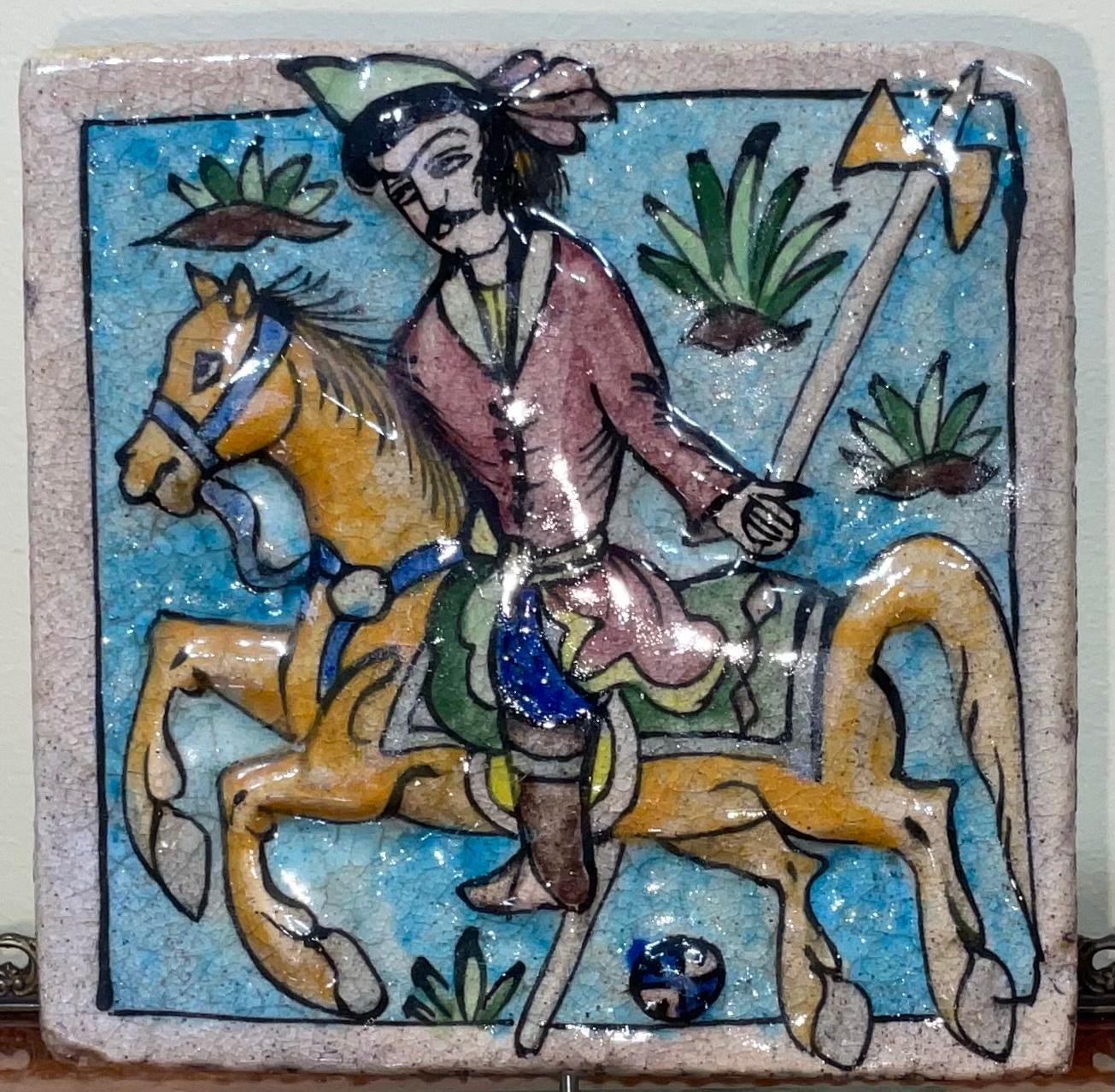 Hand painted and glazed Persian tile, mounted on a bronze base of ancient polo player on horse.
Beautiful object of art for any room 
Actual tile size : 6”.75 x 6”.75.