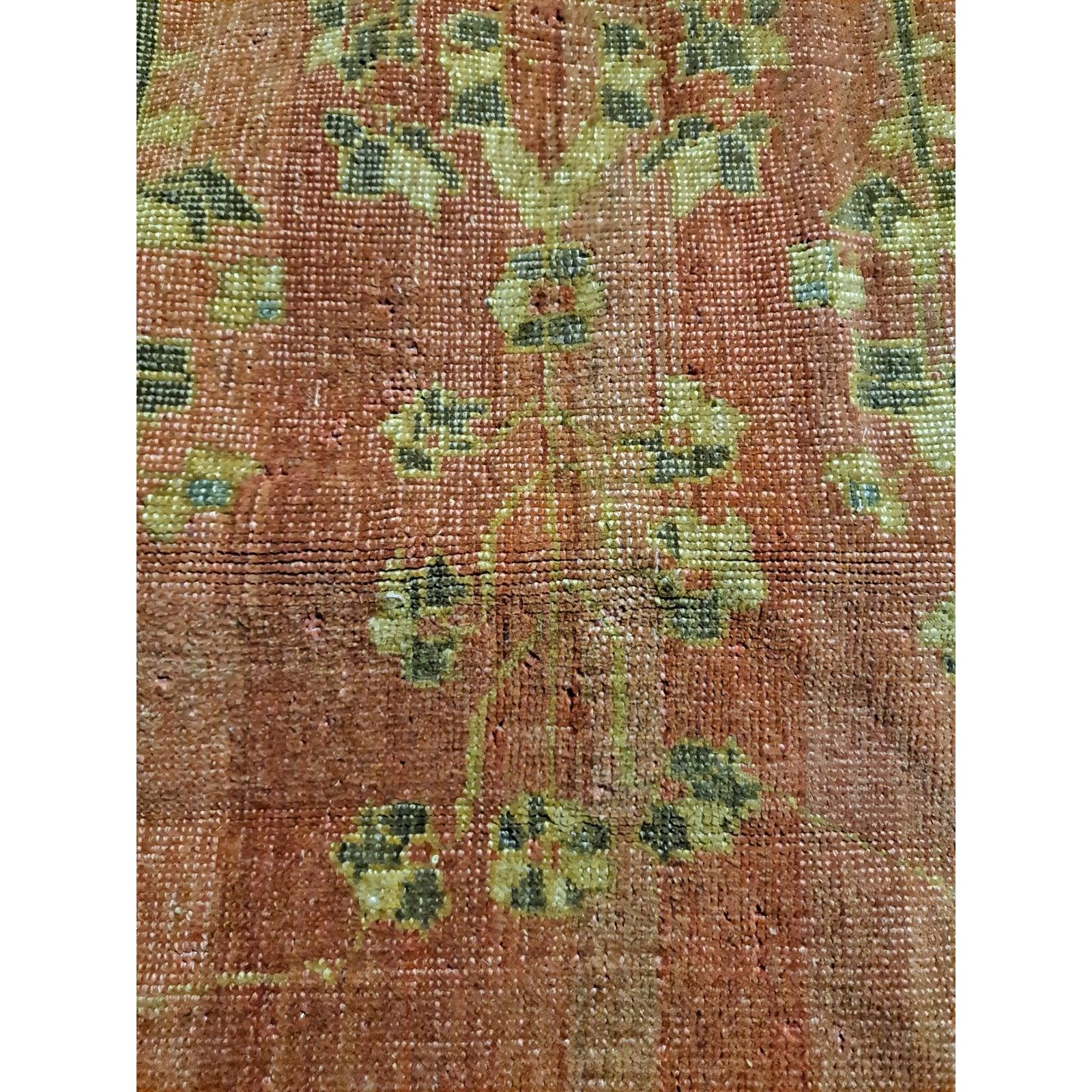 Beautiful handwoven wool Turkish Oushak rug

The rug shows ample fading, but still looks great and is a fine floor covering for a large space

10 feet 9 inches by 14 feet x 7.5 inches

Good vintage condition with ample fading

The images here show