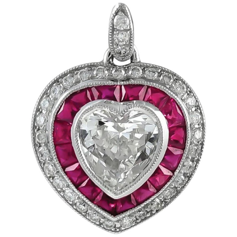 Beautiful Heart Shaped Platinum Pendant with Rubies and Diamonds For Sale